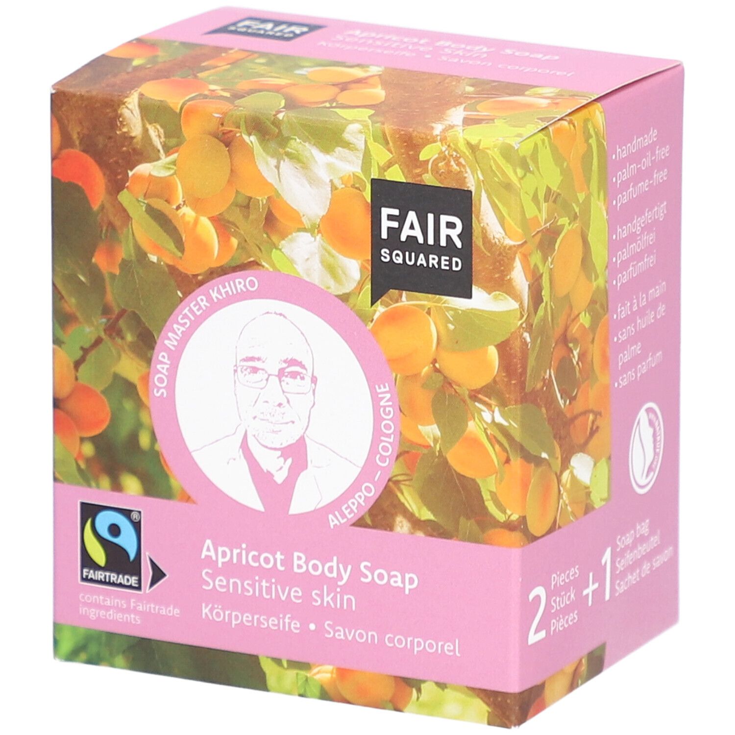 Roze verpakking met FAIR SQUARED logo, abrikozenmotief en productinformatie. Fairtrade-keurmerk.