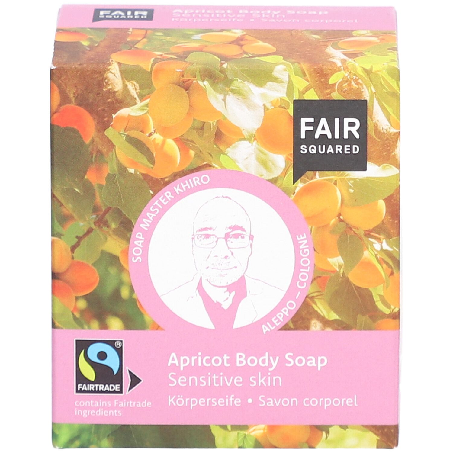 Roze verpakking met FAIR SQUARED logo, abrikozenmotief en productinformatie. Fairtrade-keurmerk.