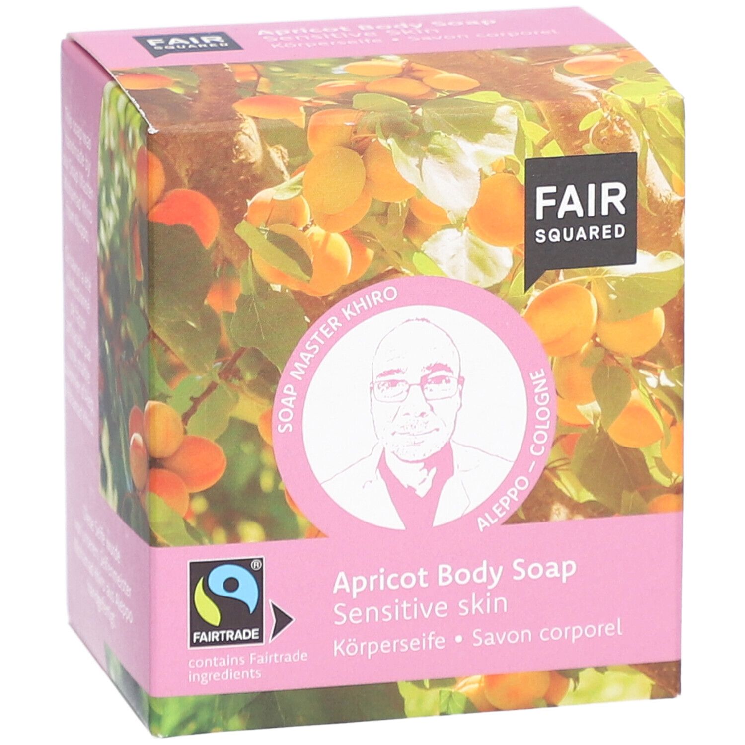 Roze verpakking met FAIR SQUARED logo, abrikozenmotief en productinformatie. Fairtrade-keurmerk.