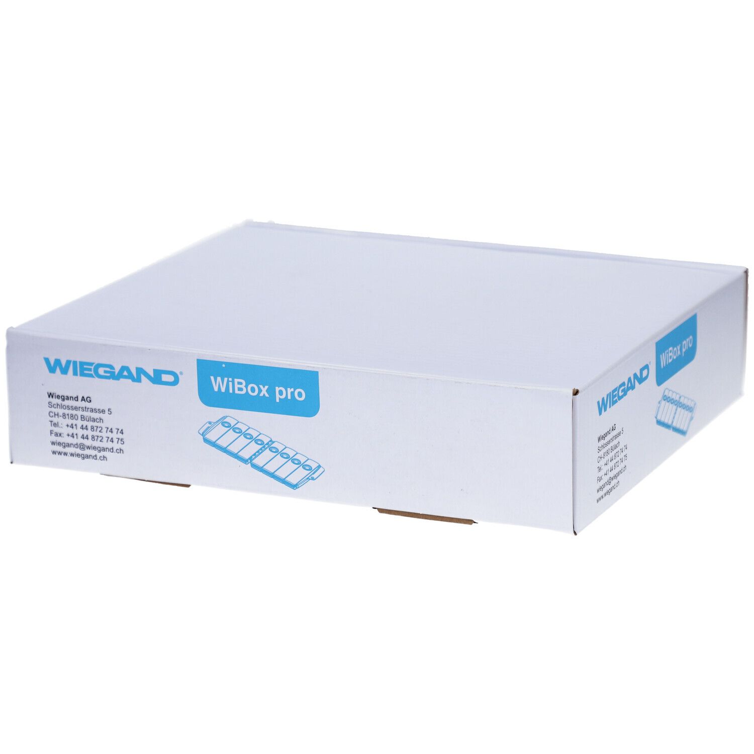 Witte verpakking met opdruk van WIEGAND, WiBox pro. Bovenaanzicht van de verpakking.