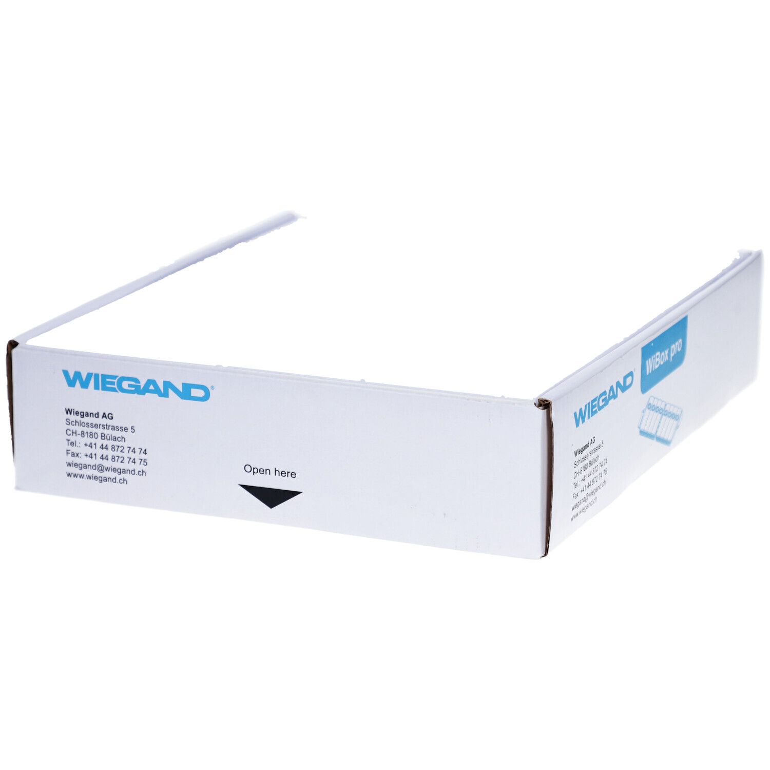 Open witte verpakking met opdruk van WIEGAND. Pijl met 'Open here' indicatie.