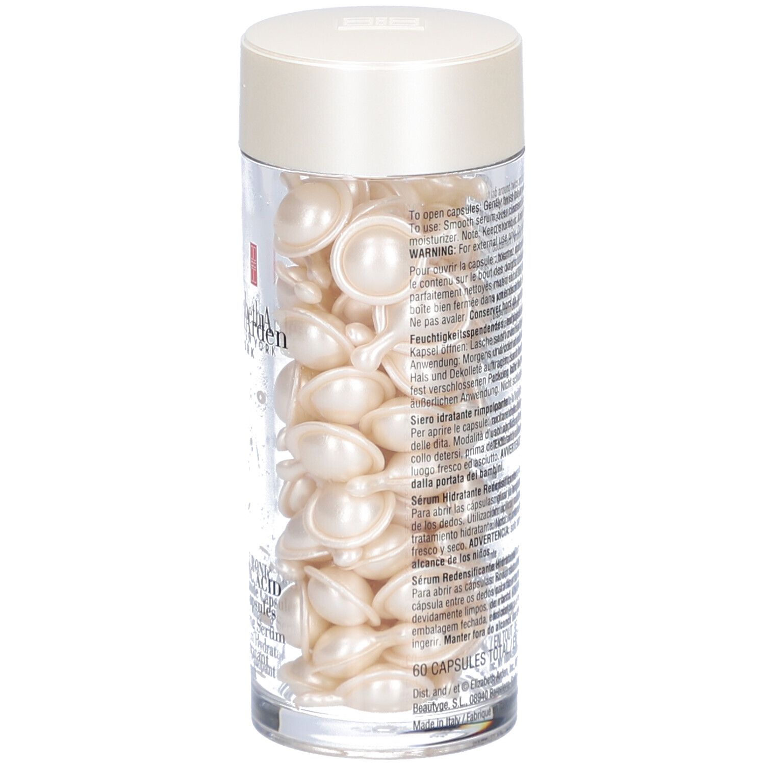Transparante container met capsules. Crèmekleurig deksel. Opschrift: Elizabeth Arden.