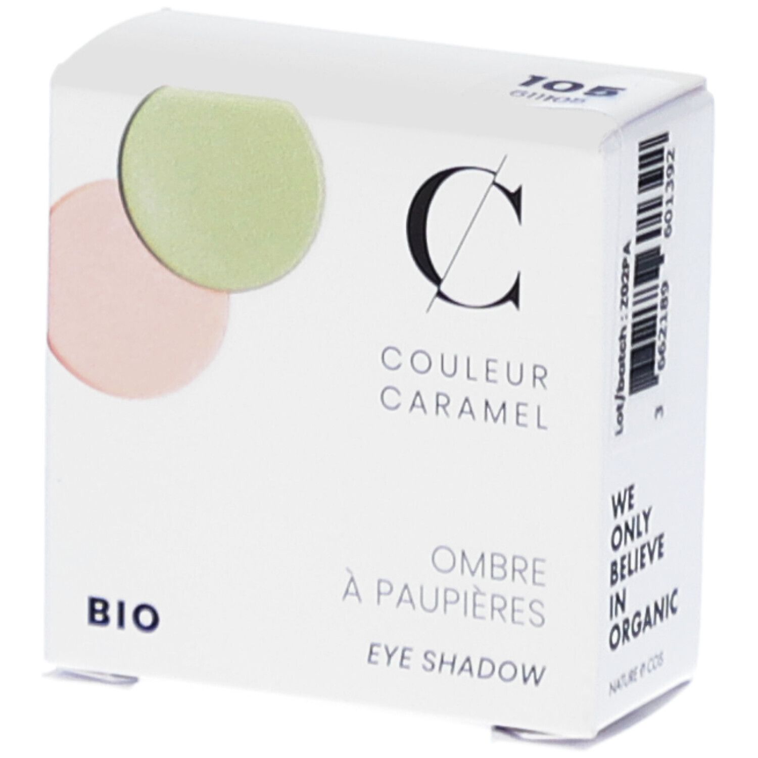 Boîte blanche avec fard à paupières. Marque COULEUR CARAMEL, BIO. Deux couleurs rondes de fard à paupières : rose et vert. Texte : Ombre à paupières.