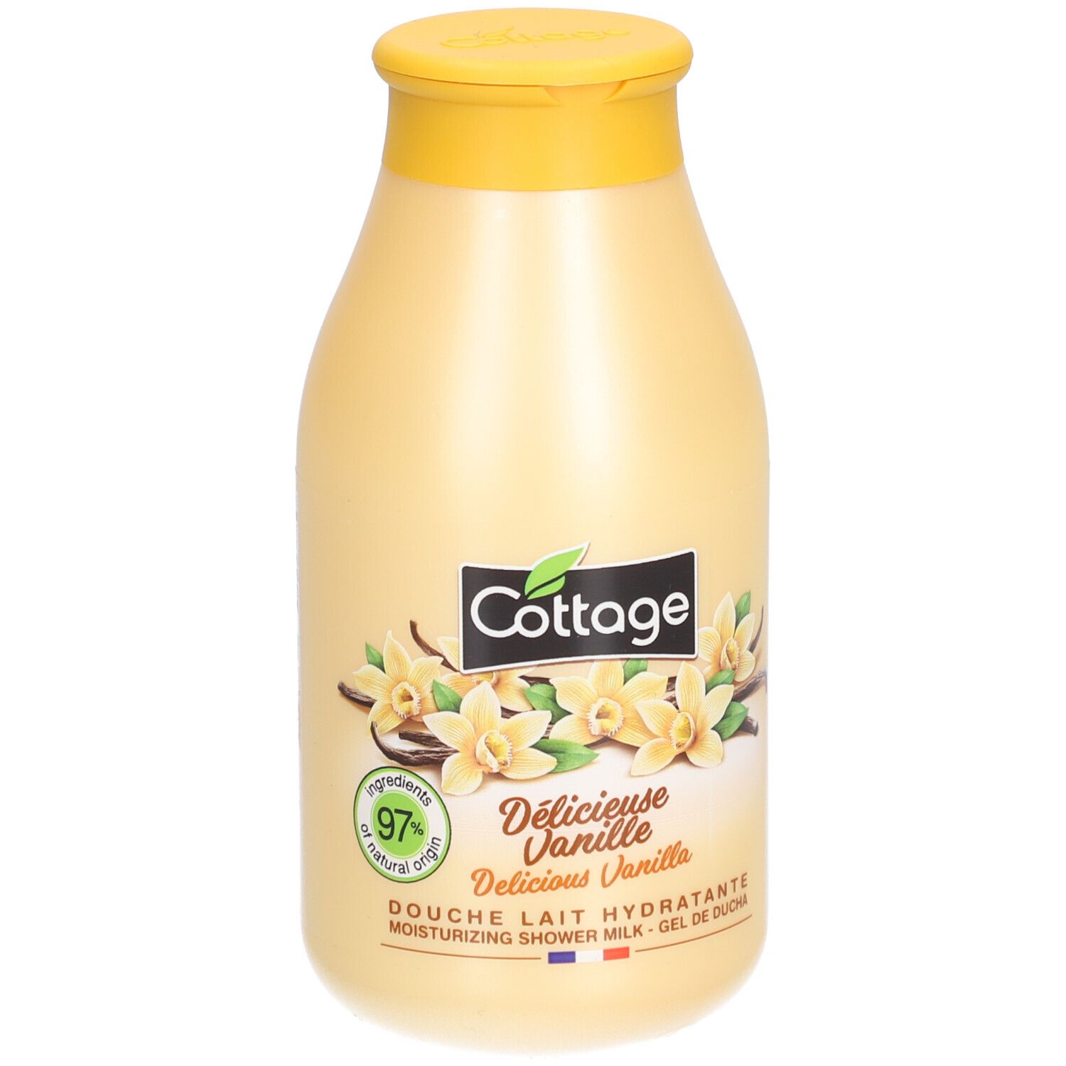 Beige fles met gele dop. Opschrift: Cottage, Délicieuse Vanille, 97% natuurlijke oorsprong. Afbeelding: vanillebloemen.