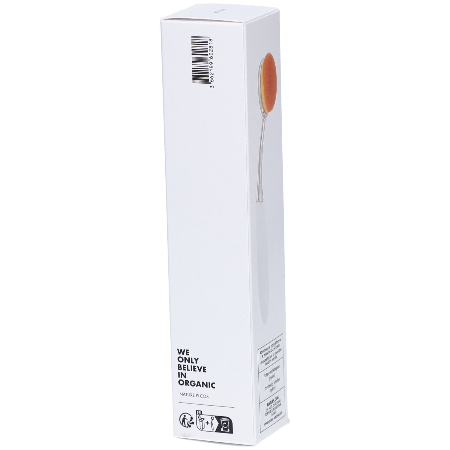 Emballage du pinceau teint n°19. "WE ONLY BELIEVE IN ORGANIC" et un code-barres sont sur l'emballage. Le pinceau est partiellement visible.