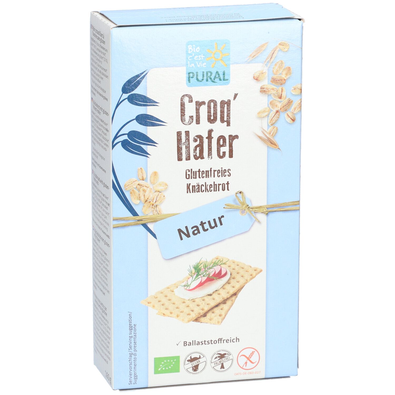Lichtblauwe kartonnen verpakking met PURAL-logo en tekst Croq'Hafer Glutenfreies Knäckebrot Natur. Afbeelding van crackers.