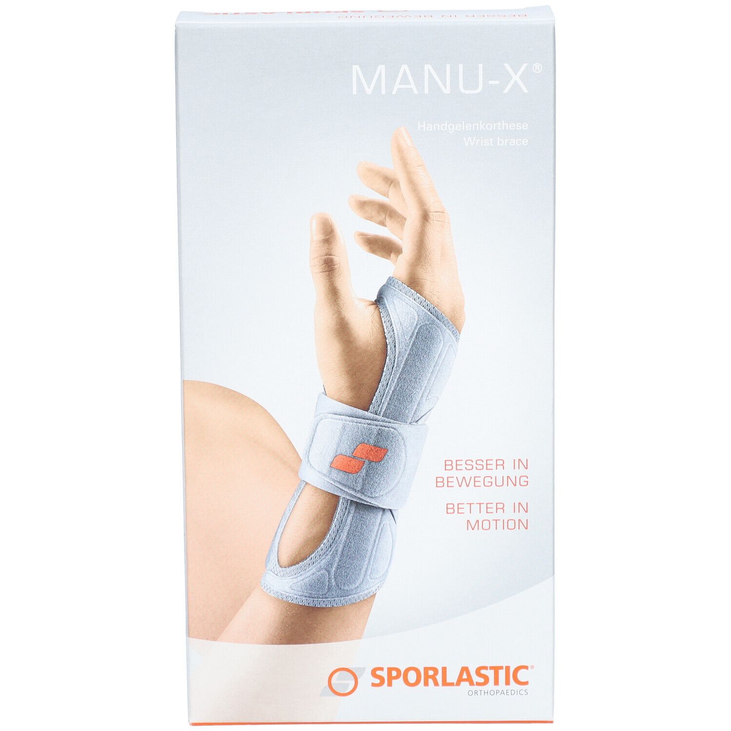 Emballage de l'orthèse de poignet Sporlastic Manu X. Image du produit avec l'orthèse sur le bras. Logo orange.