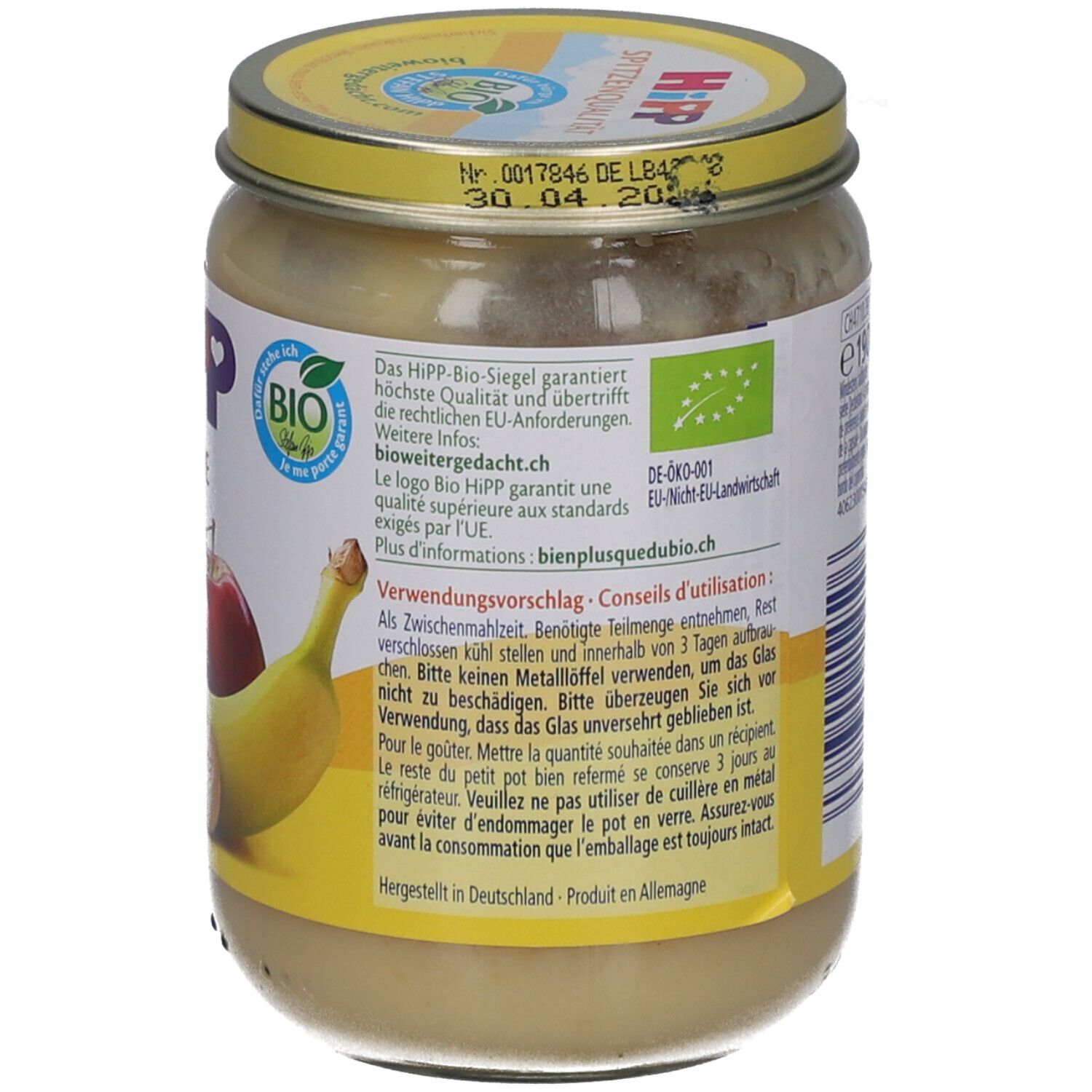 HIPP Bio-babyvoeding in pot met banaan en appel. Gele etiket met Bio-keurmerk en gebruiksinstructies.