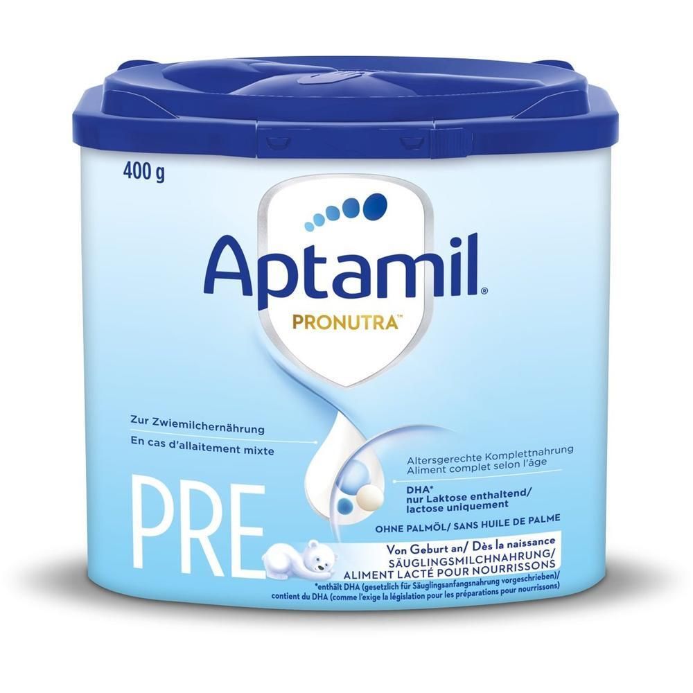Boîte bleu clair avec couvercle bleu. Inscription Aptamil Pronutra Pre. Texte: Pour l'allaitement mixte, Aliment complet selon l'âge, sans huile de palme. Avec DHA.
