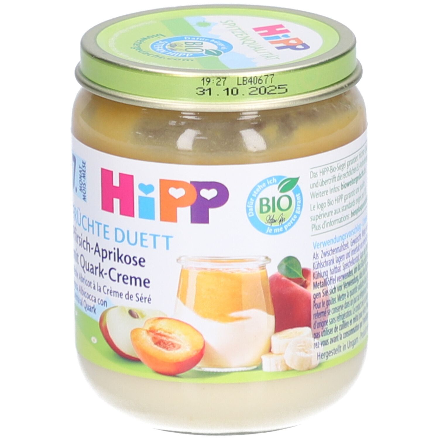 Potje fruitpuree. Opschrift: HIPP, Fruitduo Perzik-Abrikoos met Kwarkcrème. Bio-keurmerk. Houdbaarheidsdatum op deksel.