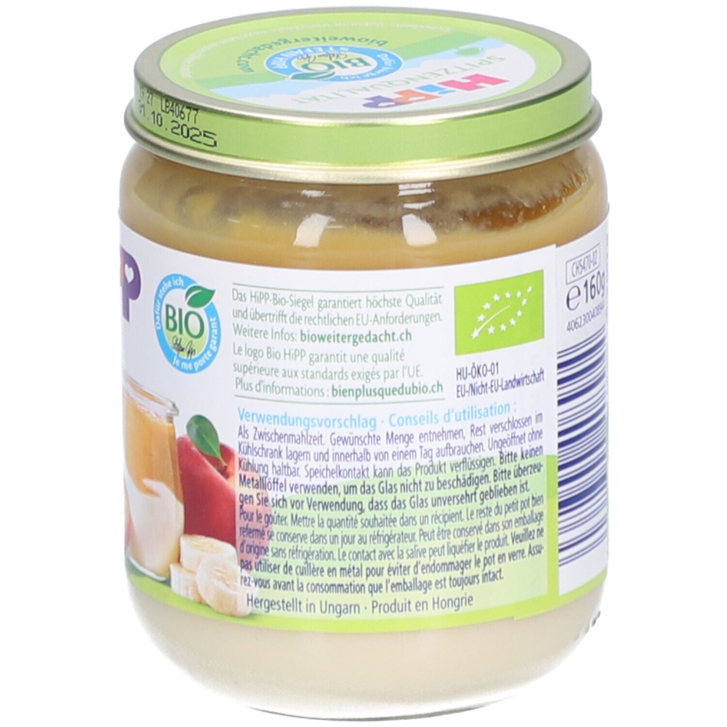 Achterkant van het potje met tekst. Opschrift: HIPP, Bio-keurmerk. 160g. Geproduceerd in Hongarije.