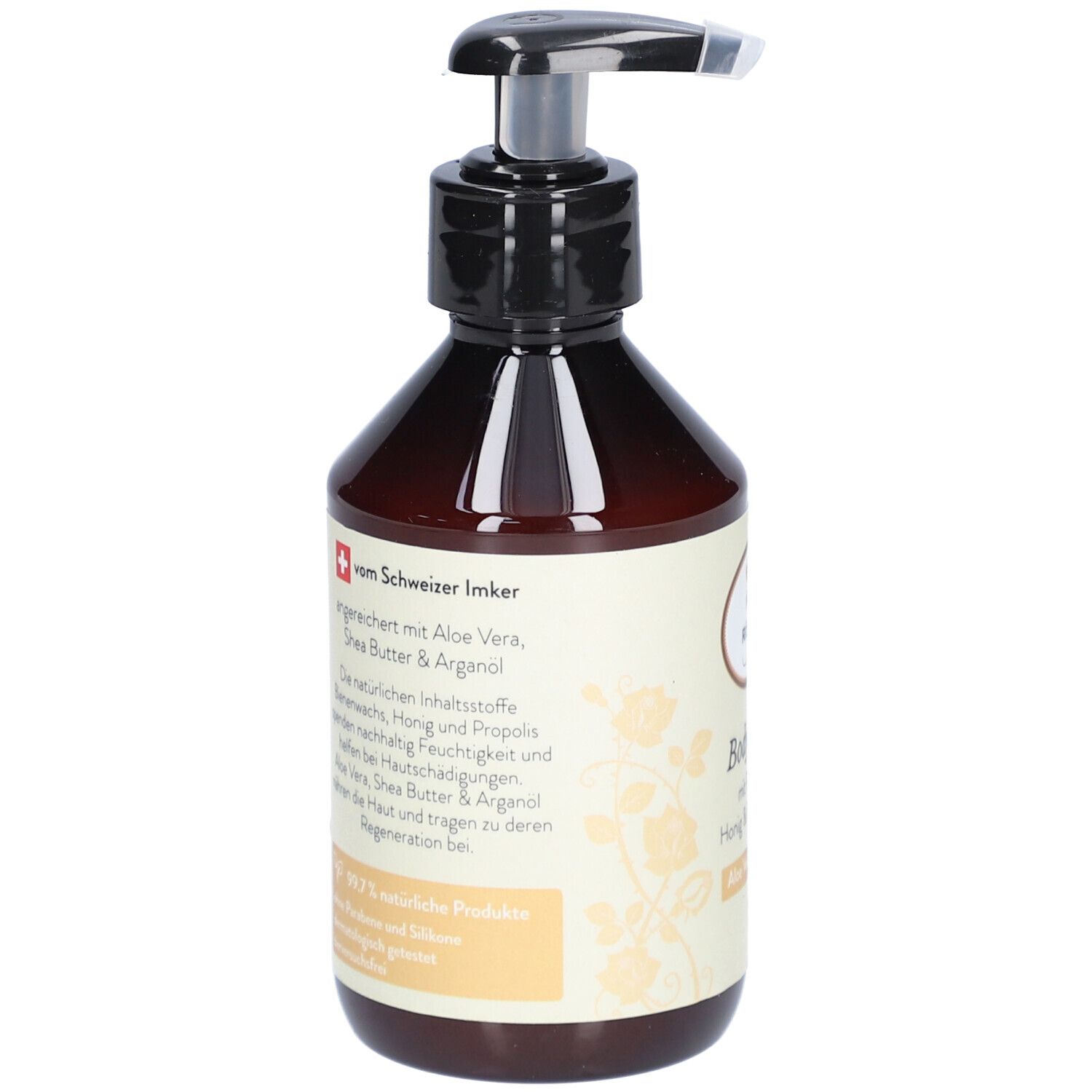 Flacon brun avec pompe noire. Étiquette avec texte et logo apiculteur suisse.