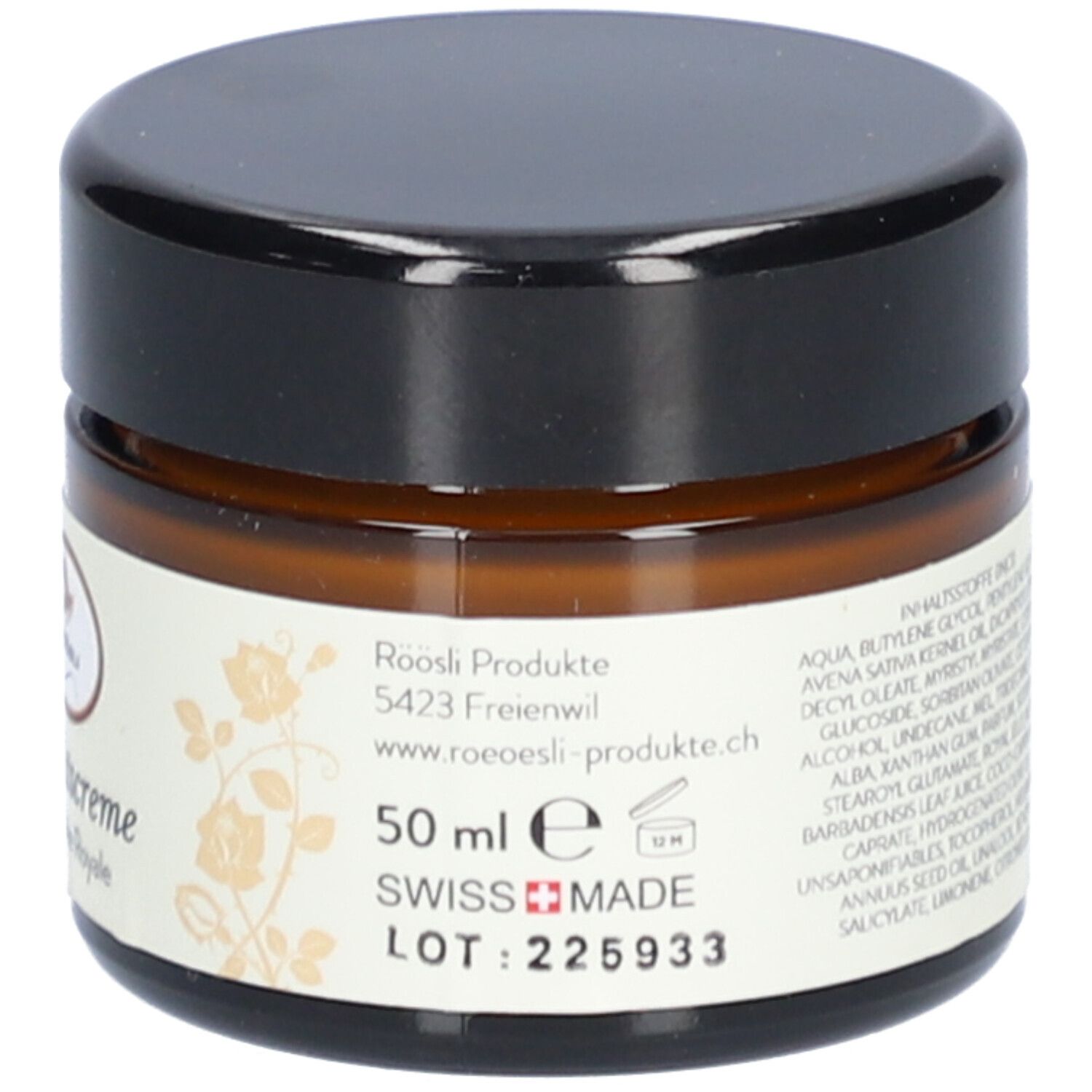 Bruine glazen pot met zwarte deksel. Label: 50 ml, Swiss Made, lotnummer, adres.