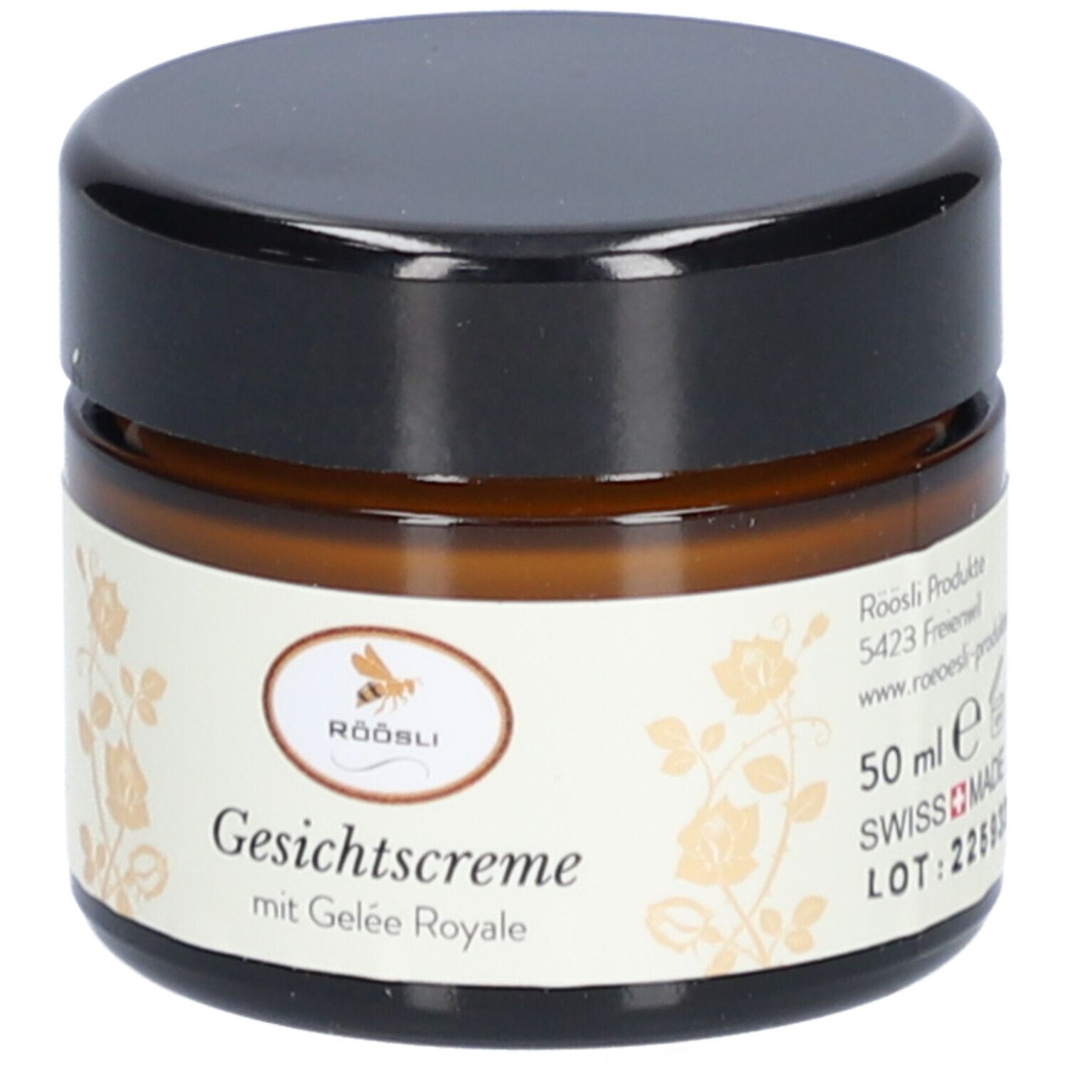Bruine glazen pot met zwarte deksel. Label: Röösli, Crème visage met Gelée Royale, 50 ml, Swiss Made.