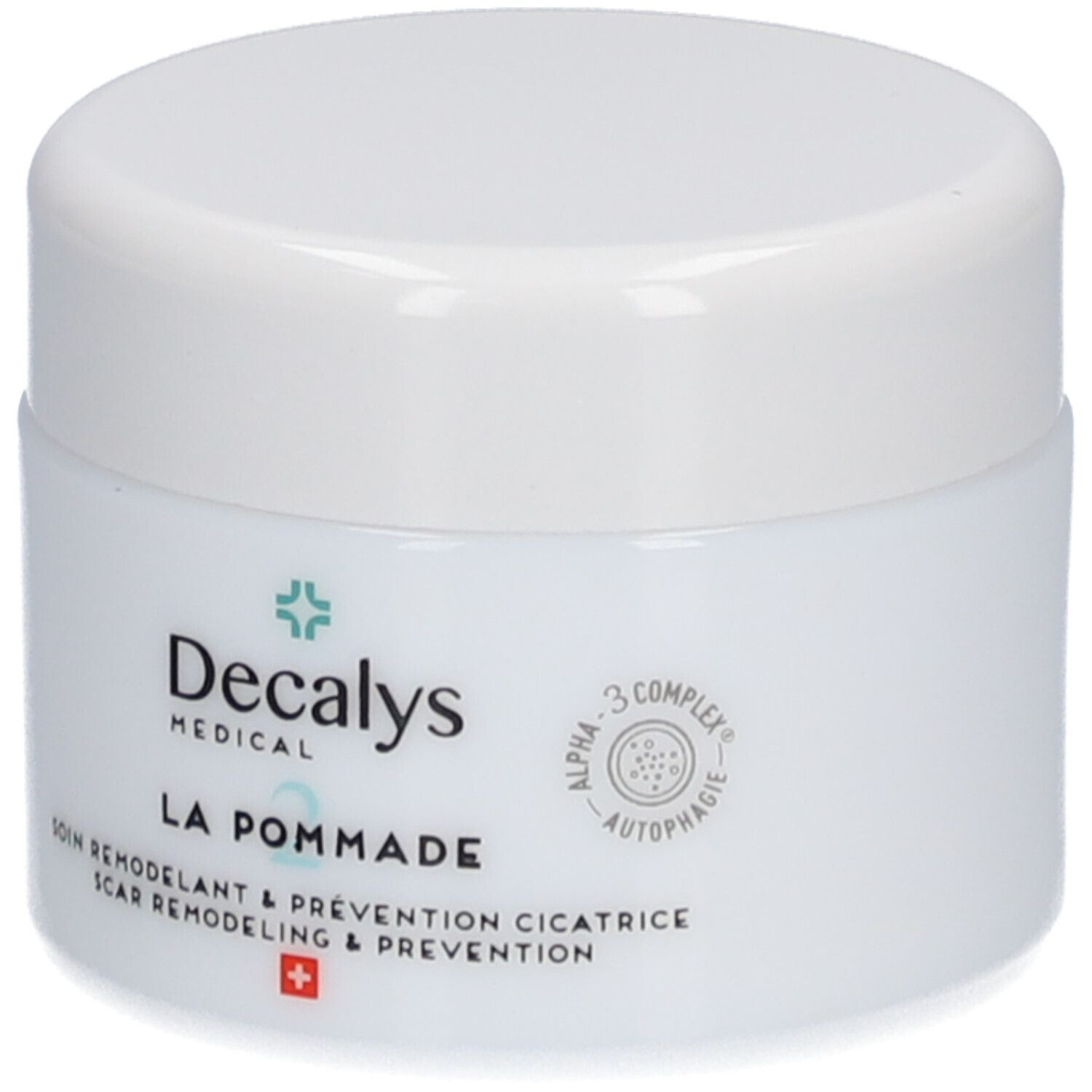 Witte pot met deksel. Opschrift: Decalys Medical, La Pommade, Alpha-3 Complex, Zwitsers kruis.