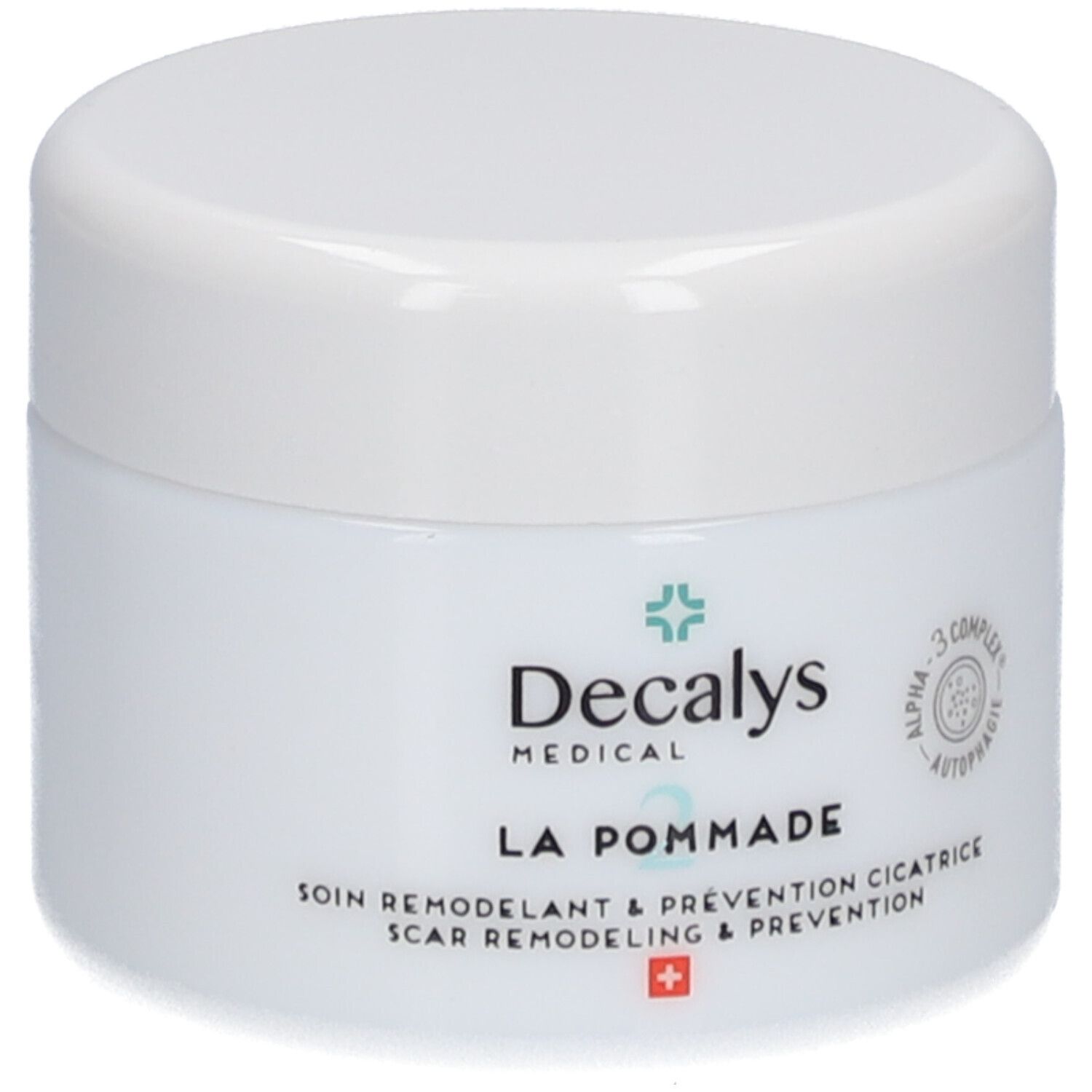 Witte pot met deksel. Opschrift: Decalys Medical, La Pommade, Alpha-3 Complex, Zwitsers kruis.