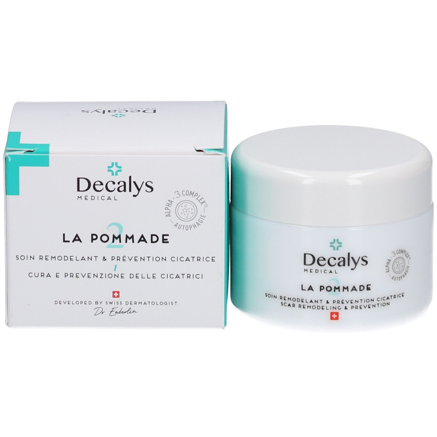 Productverpakking en pot. Opschrift: Decalys Medical, La Pommade, Alpha-3 Complex, Zwitsers kruis.