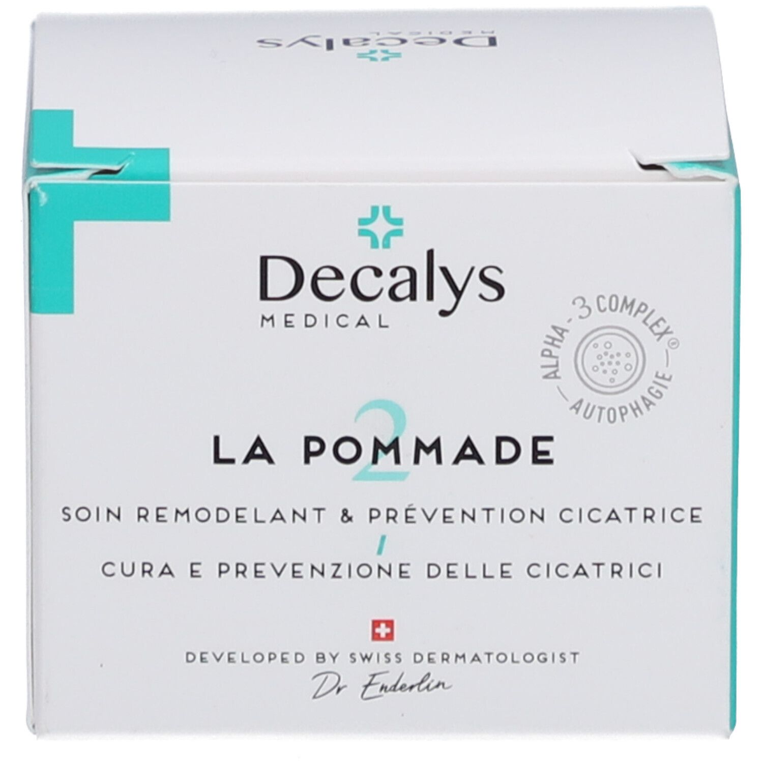 Productverpakking. Opschrift: Decalys Medical, La Pommade, Alpha-3 Complex, Zwitsers kruis.