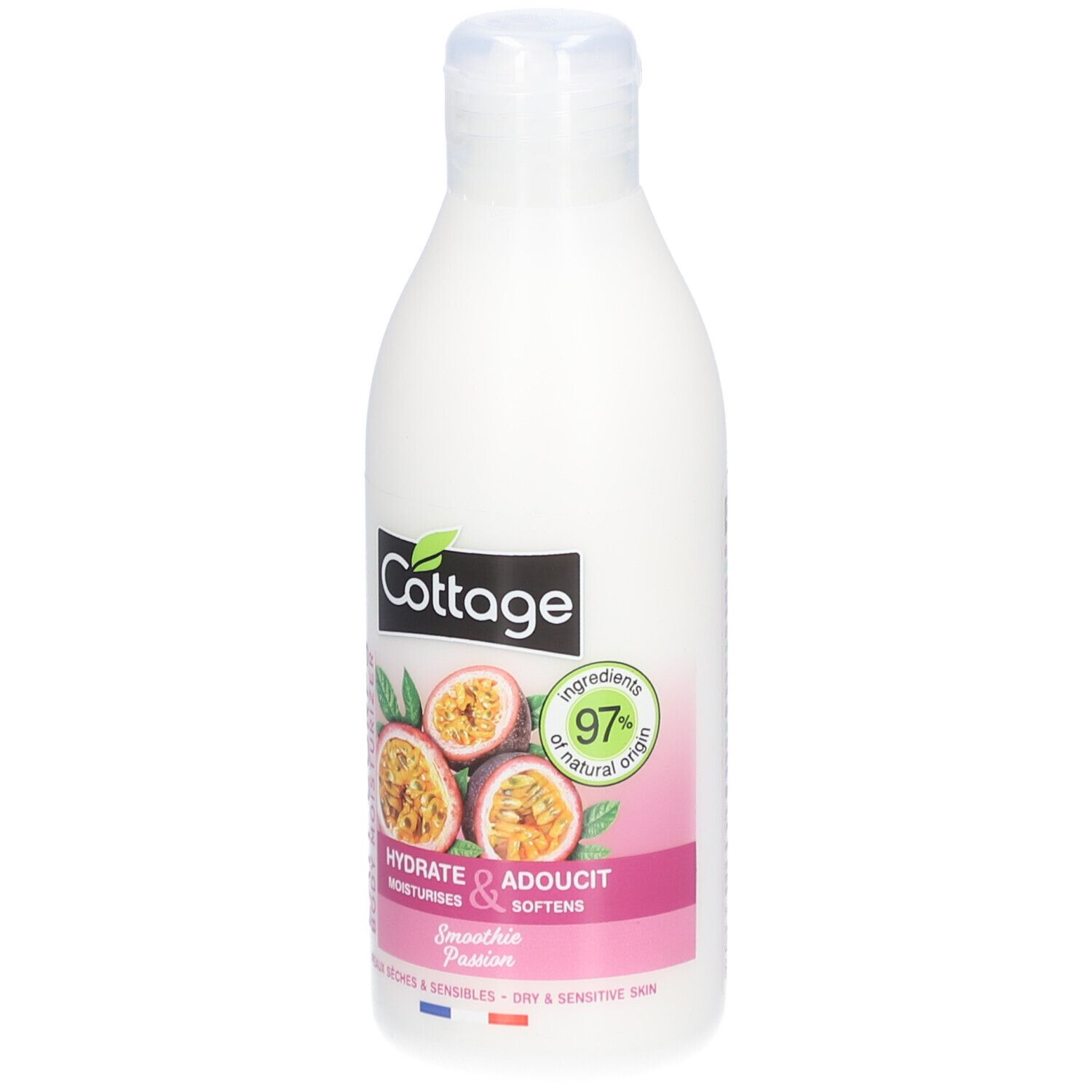 Witte fles met "Cottage" logo en passievrucht illustratie. Tekst: "Lait Corps Body Moisturizer". 