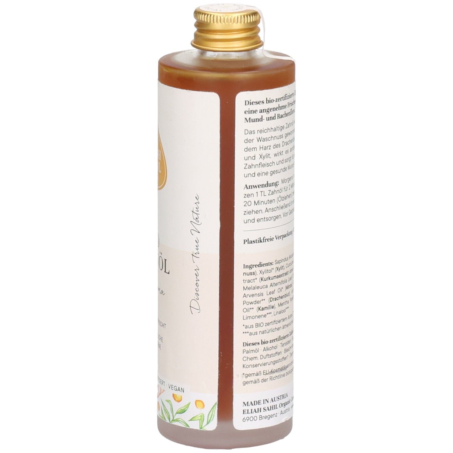 Fles met bruine vloeistof. Etiket met tekst en logo. Gouden dop. Opschrift: BIO ZAHNNÖL Kurkuma.