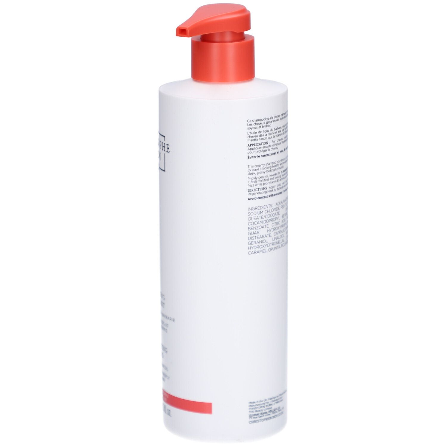 Achterkant van de witte shampoo fles met rode pomp. Tekst en ingrediënten zichtbaar.