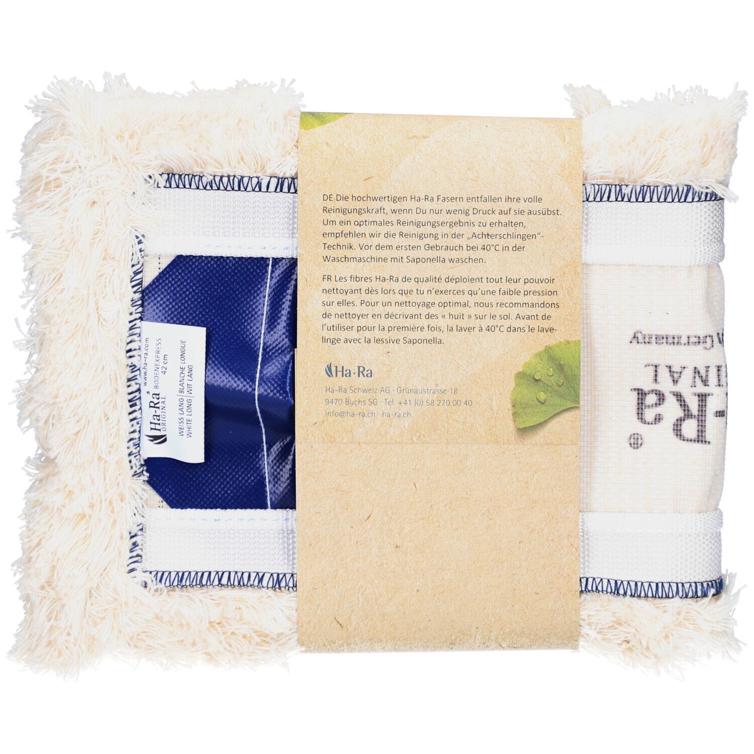 Fibre de sol blanche avec insert bleu. Emballage avec informations produit et logo. Vue arrière.