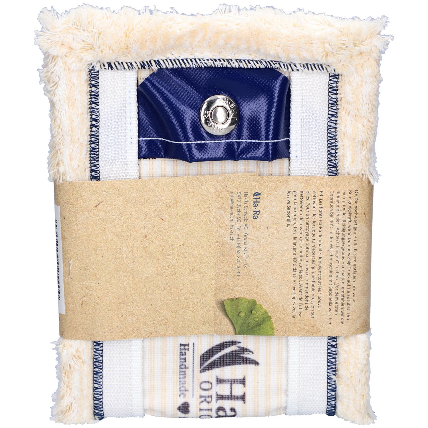 Vloervezel wit/kort. Rechthoekige reinigingsdoeken, verpakt. Productlabel met logo en tekst.