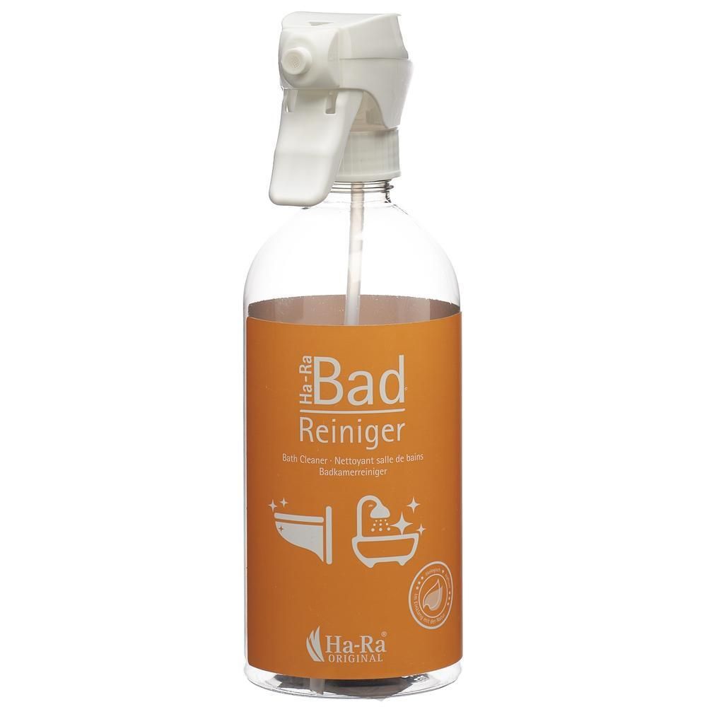 Transparante spuitfles met witte spuitkop. Oranje etiket met 'Bad Reiniger' en logo.