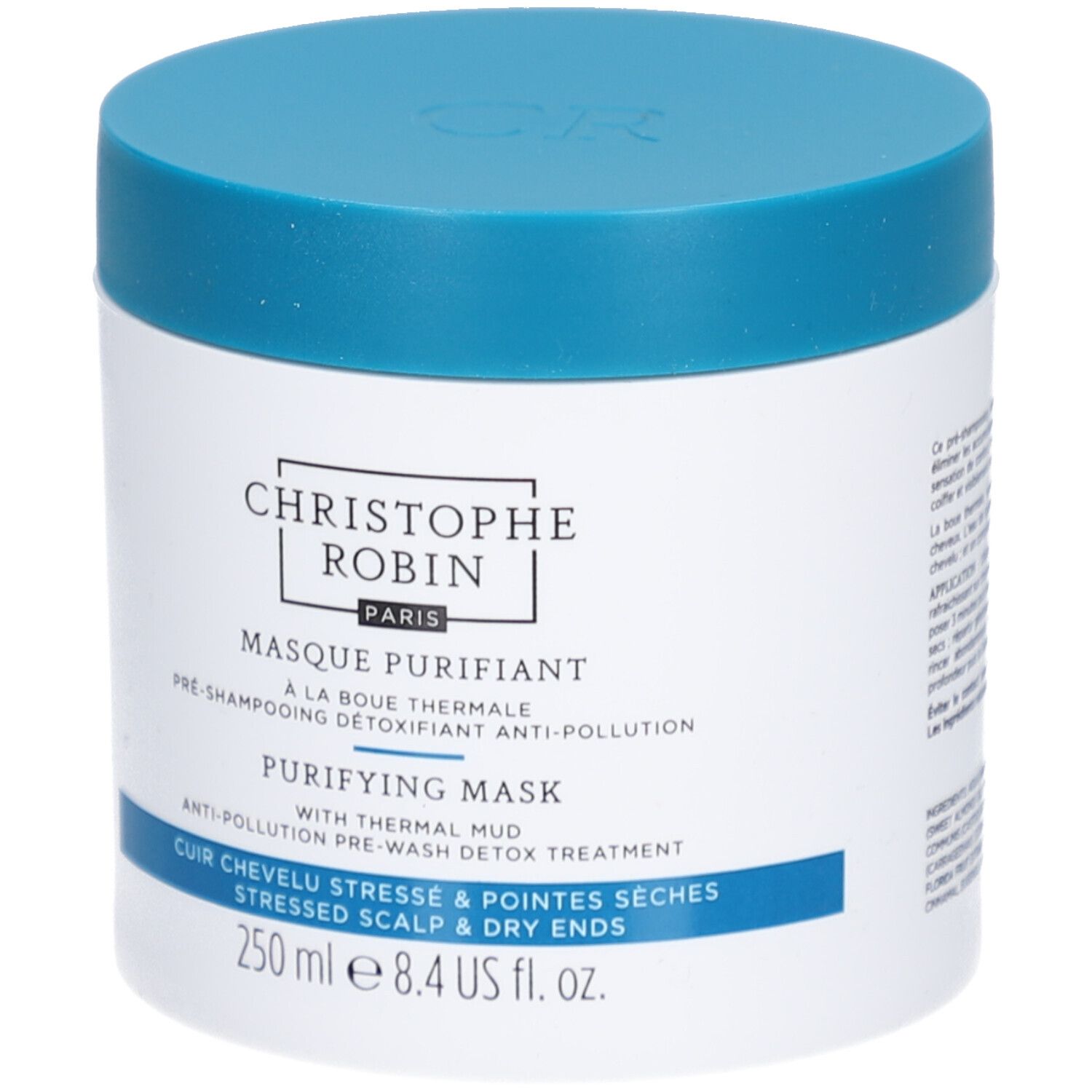 Witte pot met blauwe deksel. Opschrift: Christophe Robin, Masque Purifiant, 250 ml.