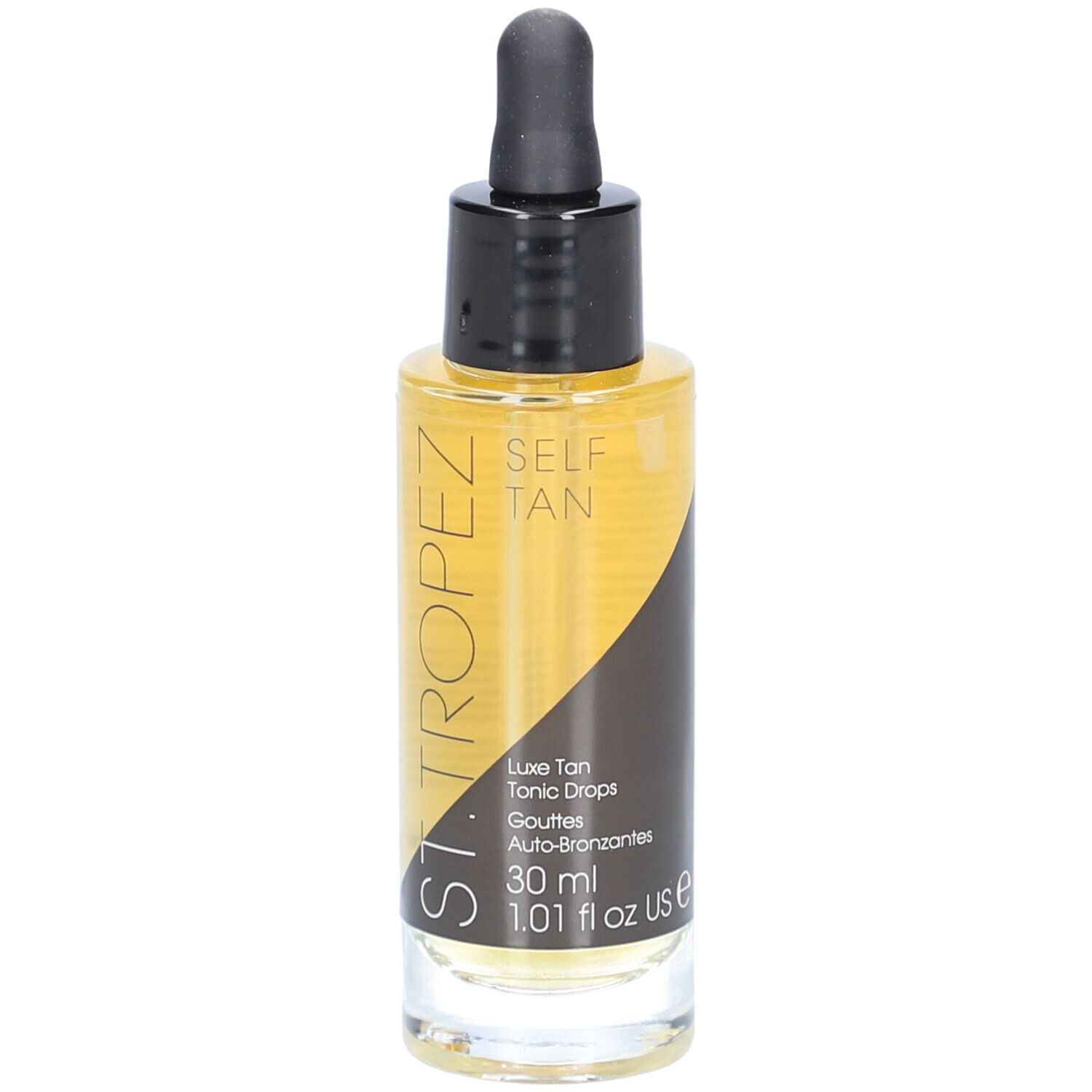 Bruine vloeistof in glazen fles met zwarte dop en pipet. Opschrift: SELF TAN, Luxe Tan Tonic Drops.