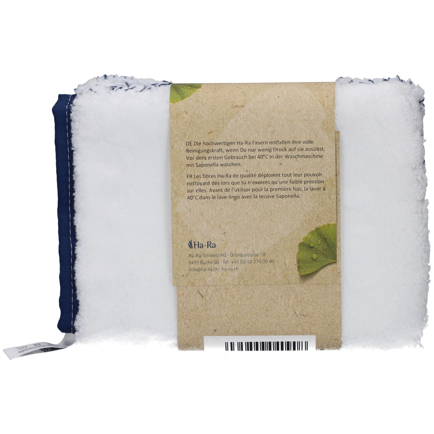 Achterkant van de schoonmaakhandschoenen. Wit met blauwe stippen, blauwe zoom. Papieren band met tekst en logo.