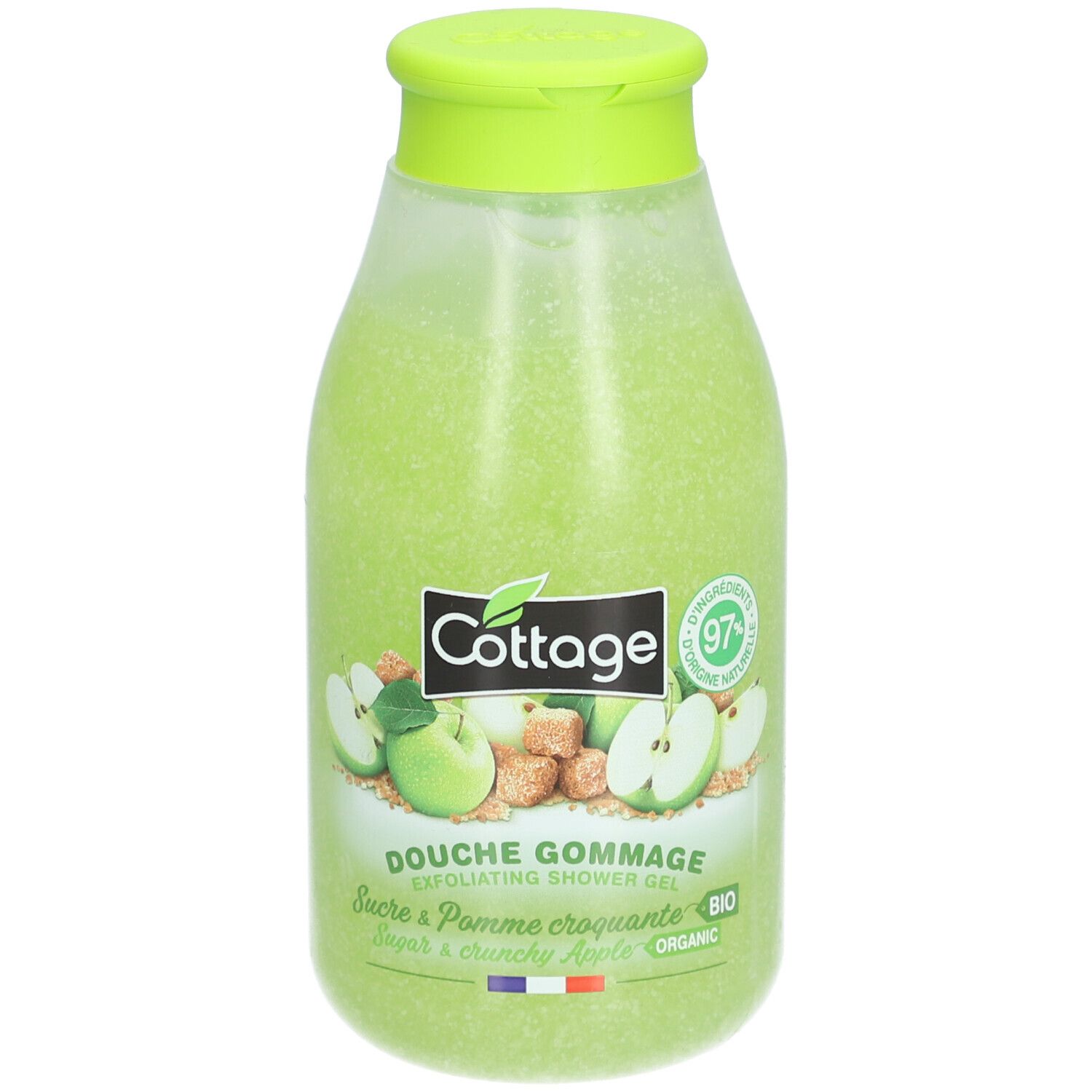 Groene douchescrub van Cottage. Fles met groene dop. Etiket met appelillustraties en tekst.