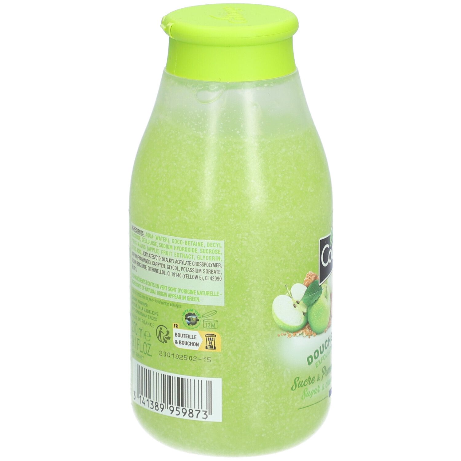 Achterkant van de groene douchescrubfles van Cottage. Etiket met ingrediënten en tekst.