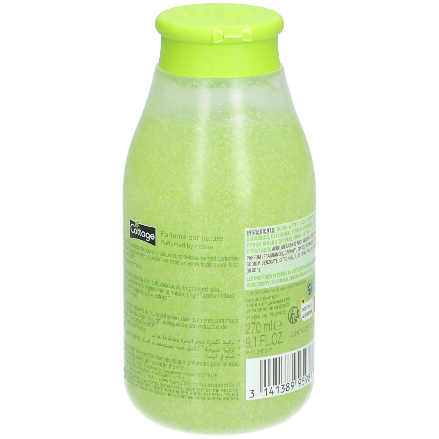 Achterkant van de groene douchescrubfles van Cottage. Etiket met ingrediënten en tekst.