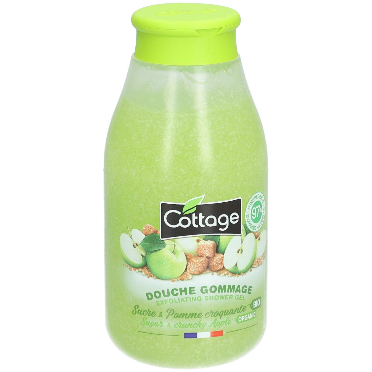 Groene douchescrub van Cottage. Fles met groene dop. Etiket met appelillustraties en tekst.
