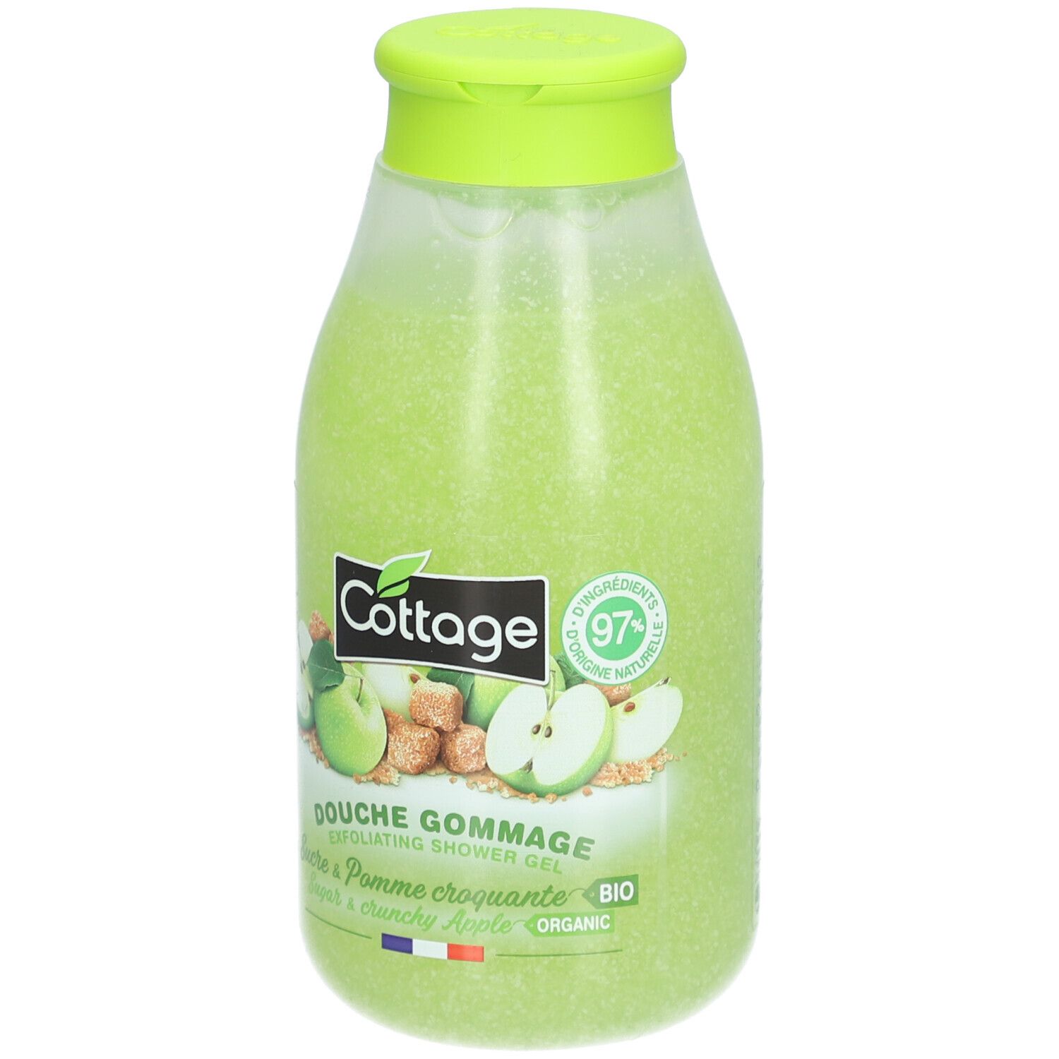 Groene douchescrub van Cottage. Fles met groene dop. Etiket met appelillustraties en tekst.