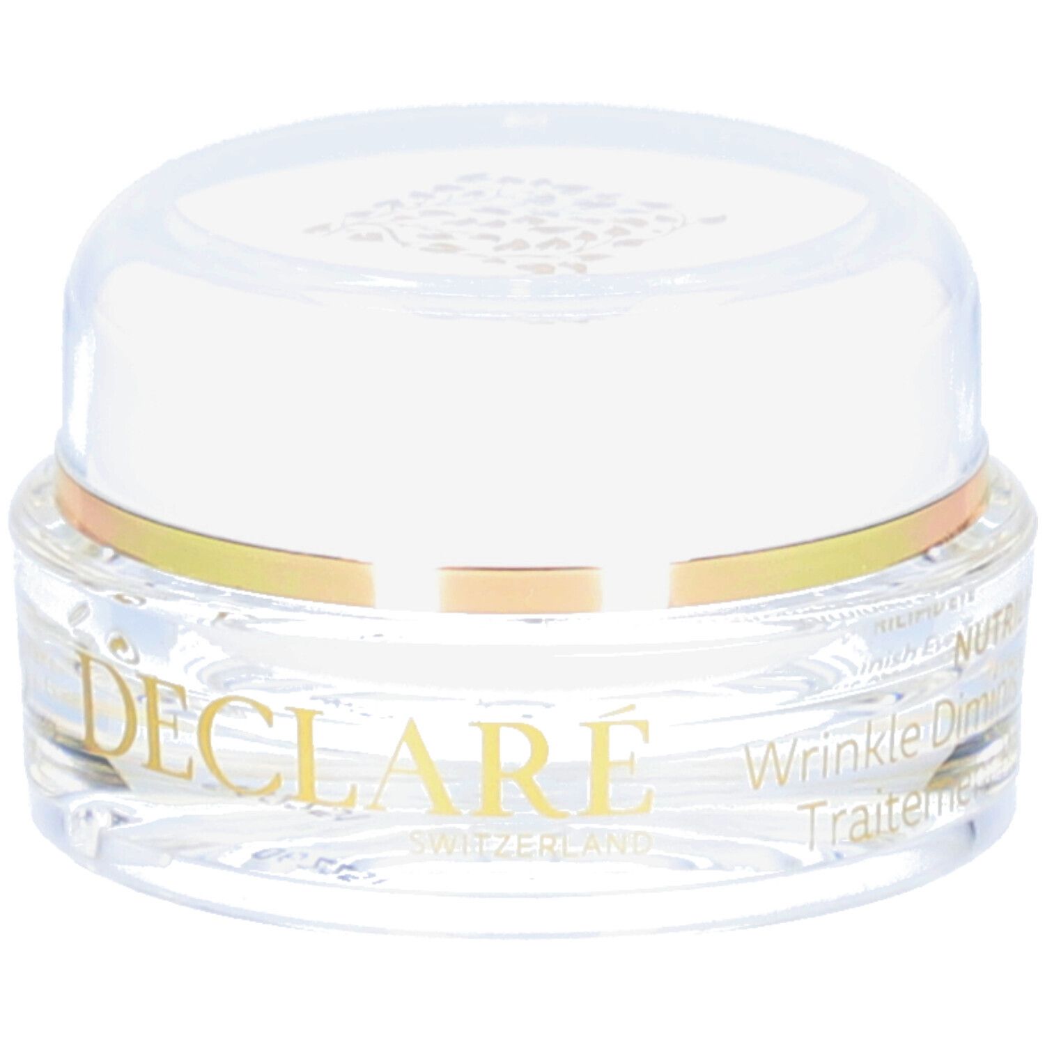Pot transparent avec couvercle blanc et anneau doré. Logo DECLARÉ et inscription « SWITZERLAND » visibles. Désignation du produit.