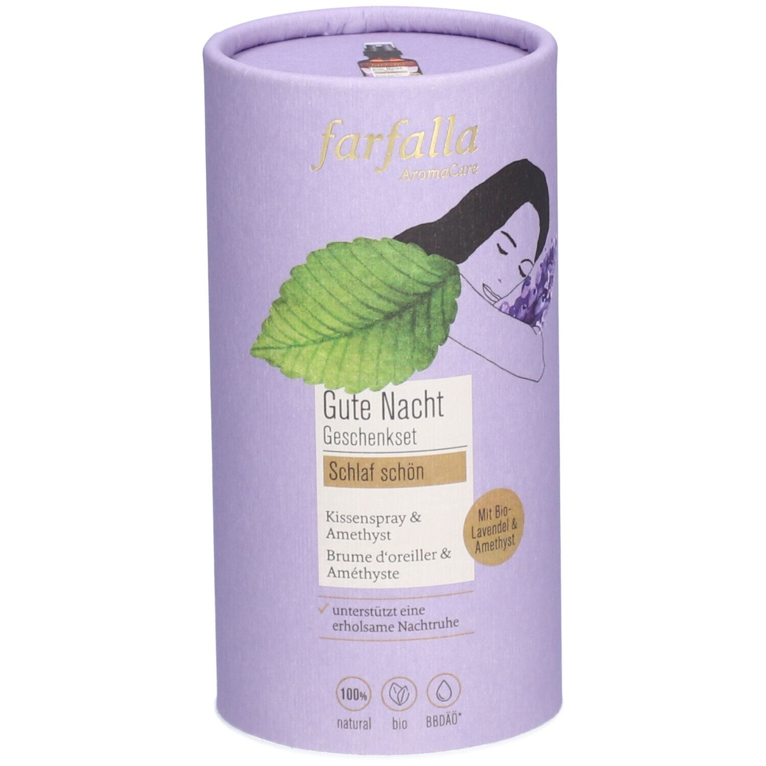 Cilindrische verpakking, lichtlila. farfalla logo, illustratie van een slapende persoon met lavendel. Tekst: Gute Nacht Geschenkset, Kissenspray & Amethyst.