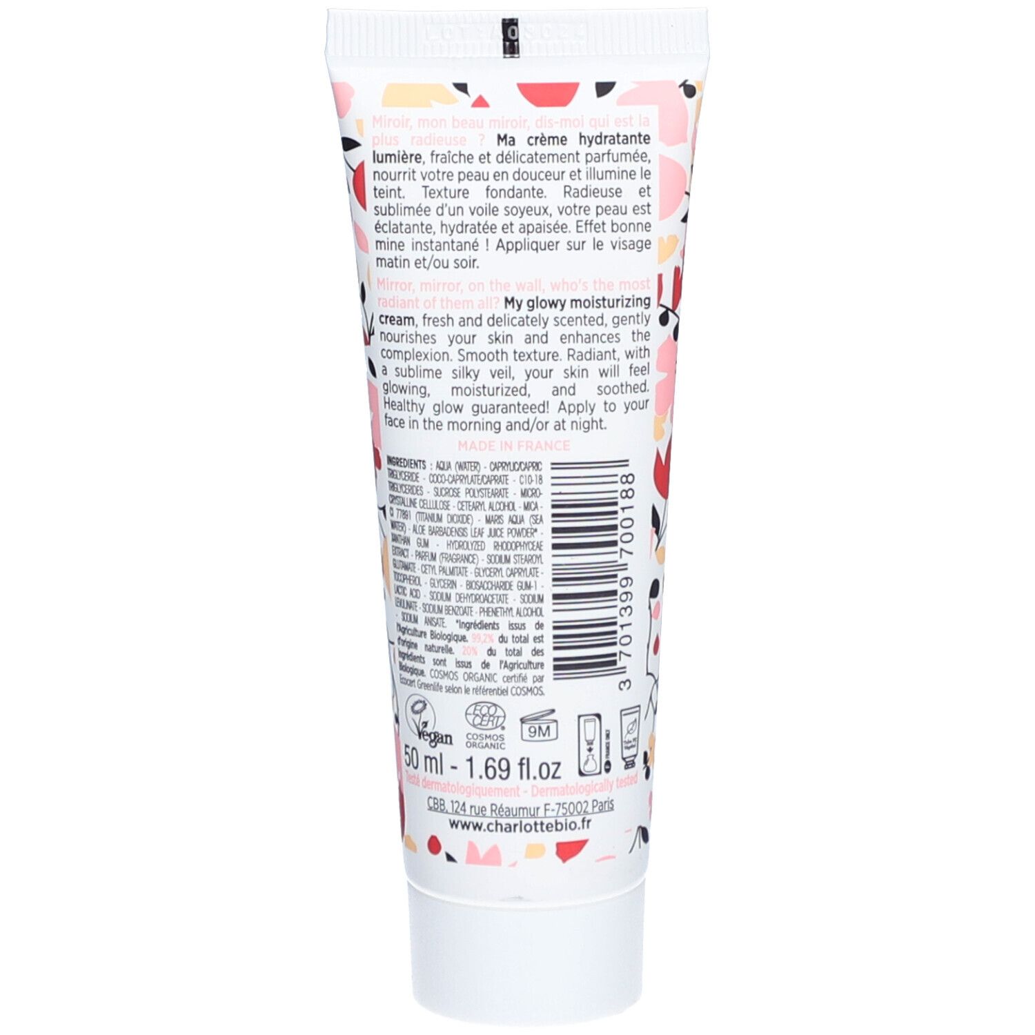 Achterkant van de crèmetube met bloemenpatroon. Bevat tekst in het Frans en Engels, en ingrediënten.