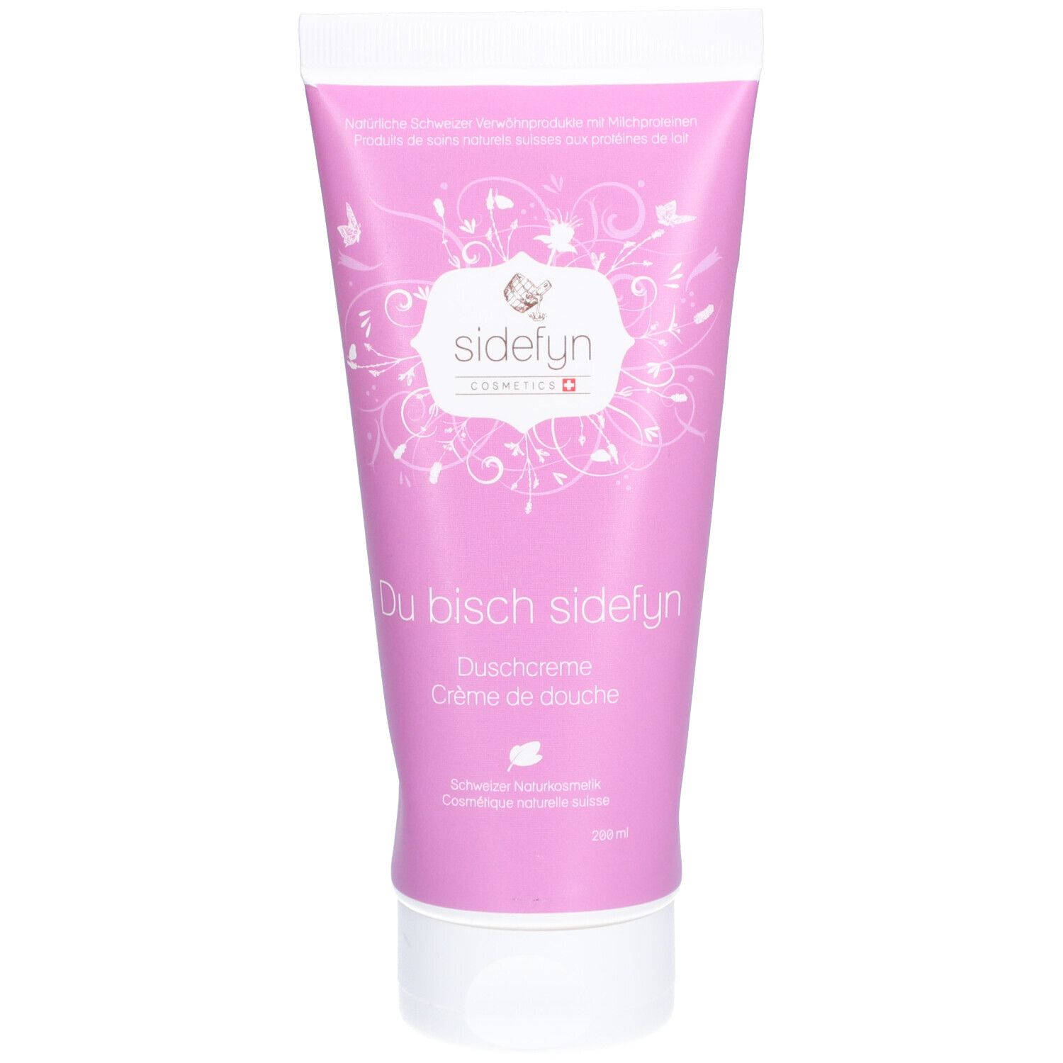 Roze tube met witte dop. Opschrift: Sidefyn, Du bisch sidefyn, Douchecrème. Zwitserse natuurlijke cosmetica.