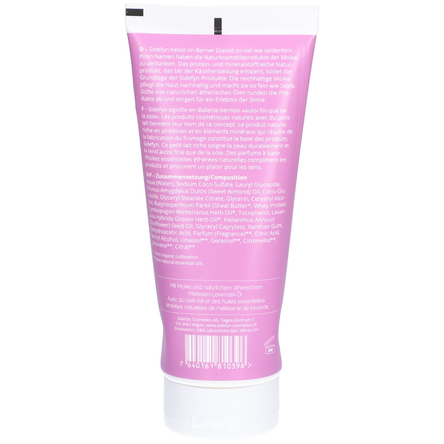 Achterkant van de roze tube. Tekst in het Duits, Frans en Italiaans. Streepjescode en ingrediënten.