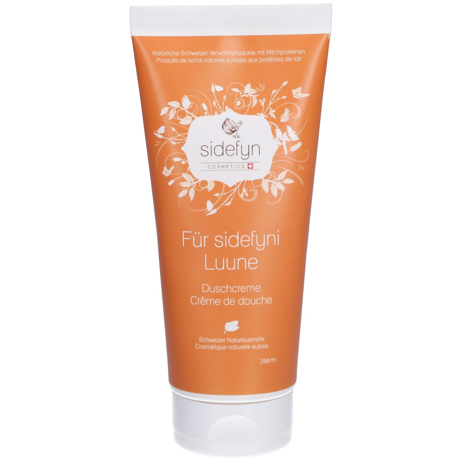 Oranje tube met witte dop. Opschrift: sidefyn, Luune, Douchcrème. Zwitserse natuurlijke cosmetica.