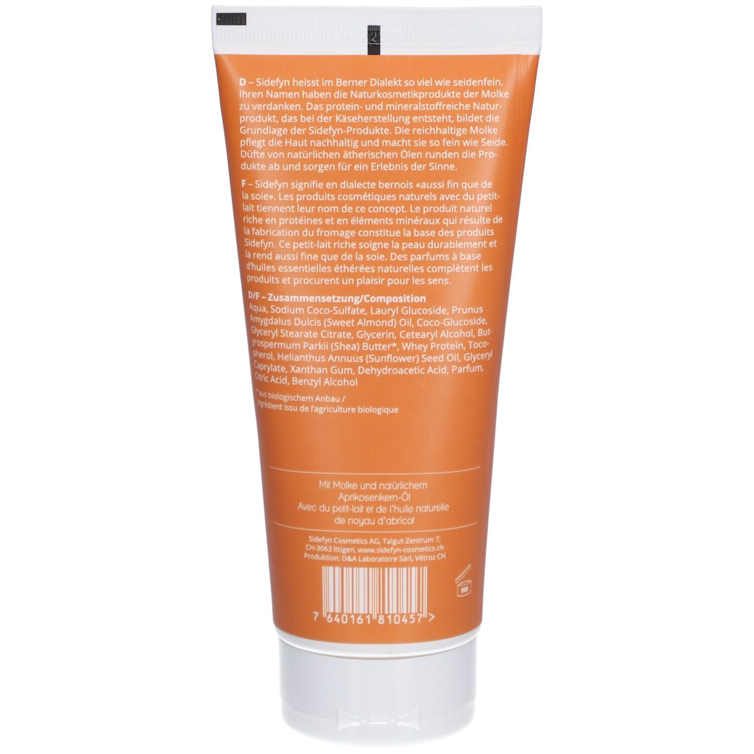 Achterkant van de tube. Tekst in het Duits, Frans. Ingrediënten. Streepjescode. Opschrift: Abrikozenolie.
