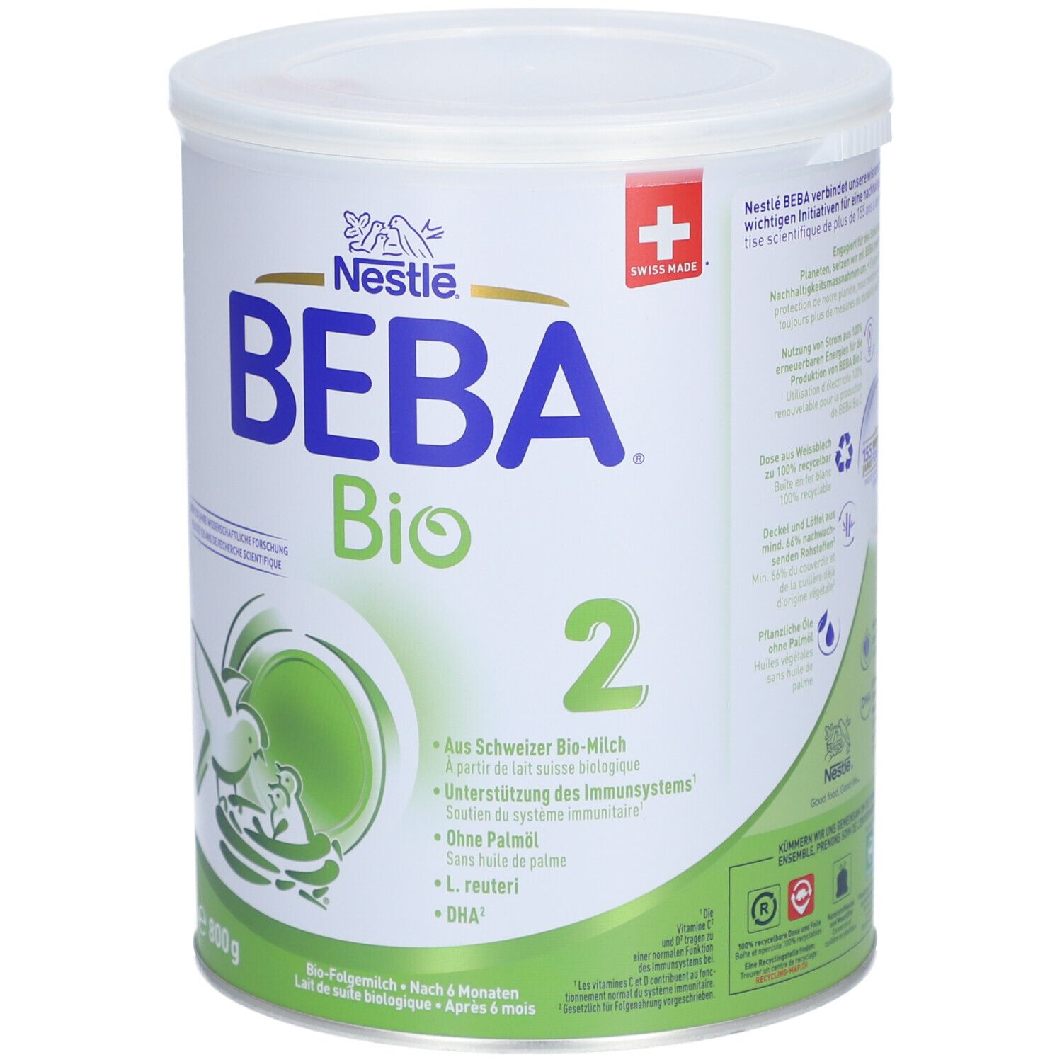 Boîte blanche Nestlé BEBA Bio 2. Croix suisse. 800g. Détails verts. Texte: Au lait bio suisse, DHA.