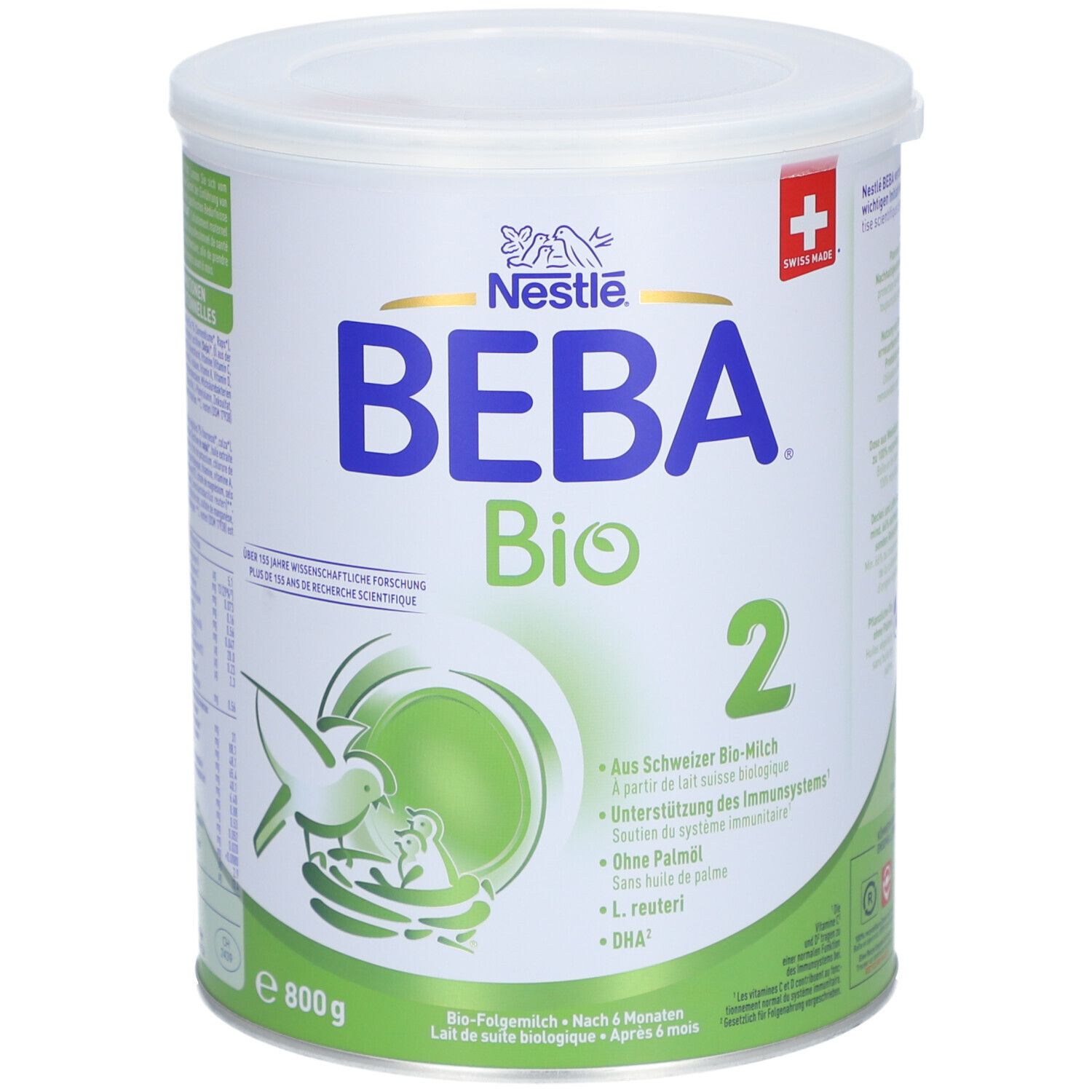 Boîte blanche Nestlé BEBA Bio 2. Croix suisse. 800g. Détails verts. Texte: Au lait bio suisse, DHA.