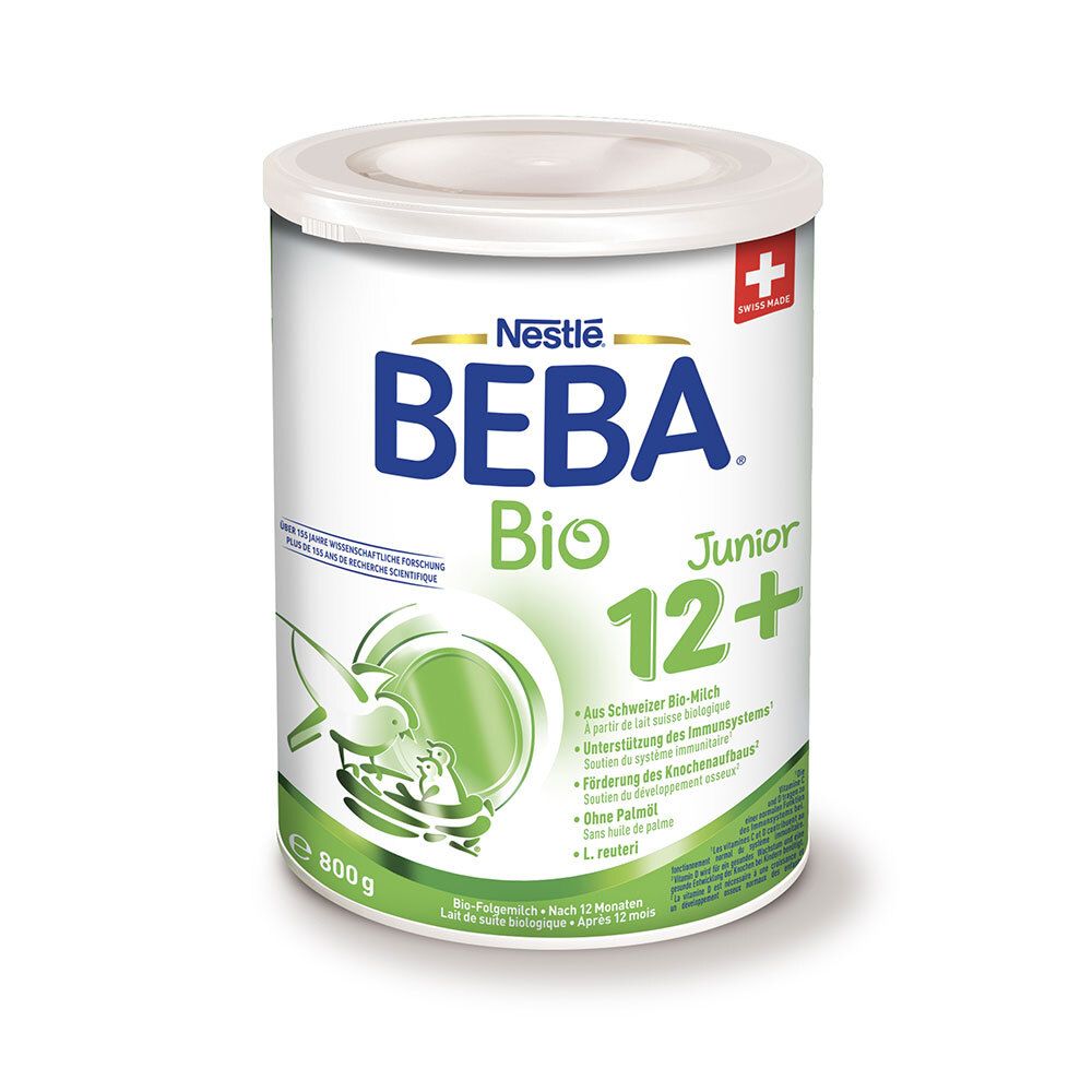 Boîte blanche avec couvercle. Inscription BEBA Bio 12+. Croix suisse. 800g. Graphique vert et blanc.