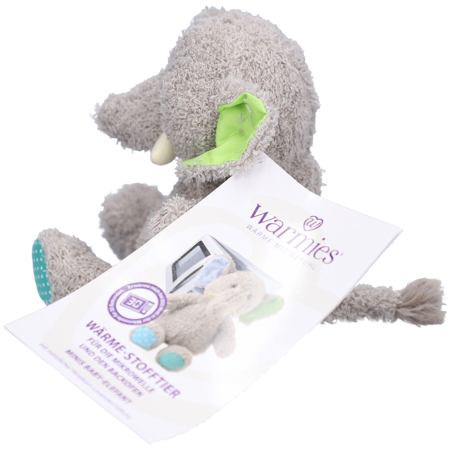 Grijze stoffen olifant met label. Opdruk: magnetron, baby-olifant. Logo Warmies®.
