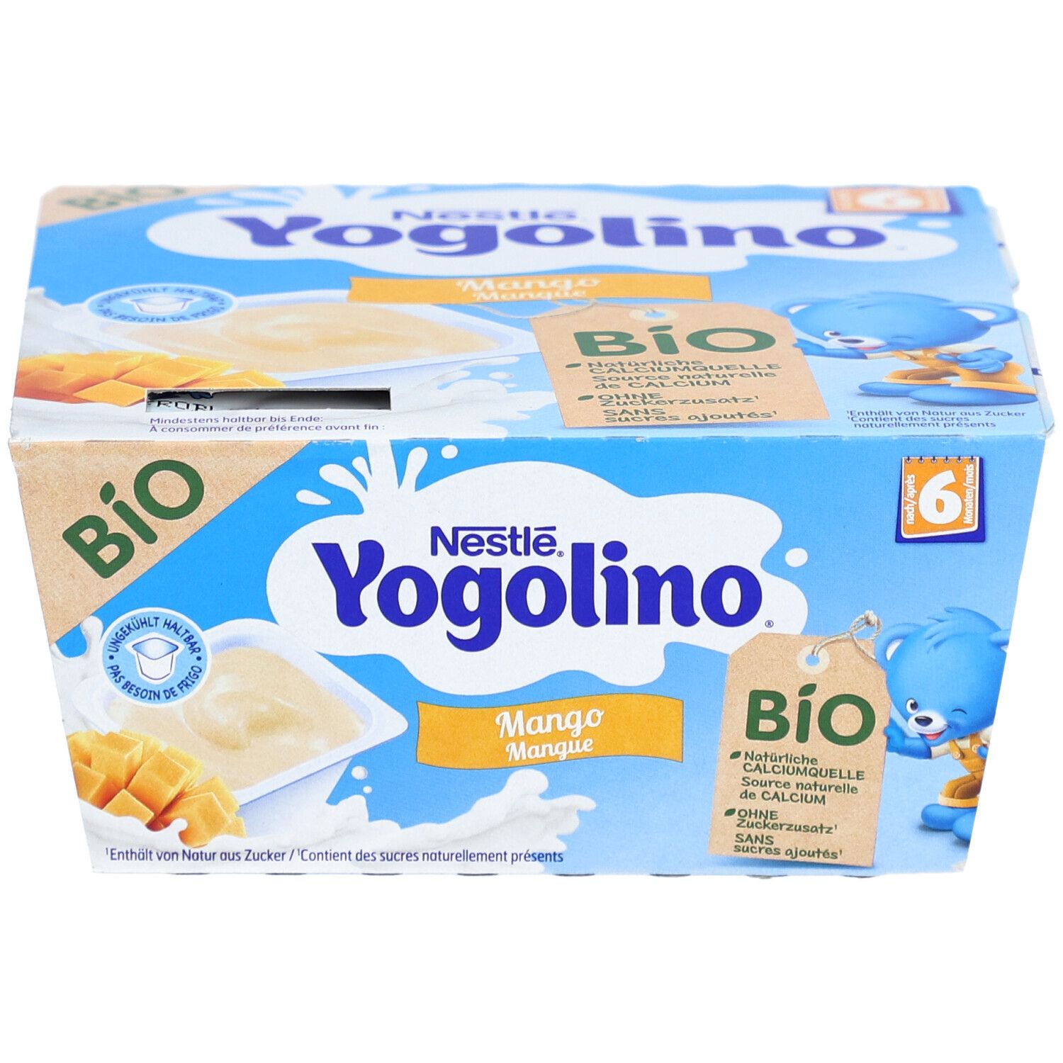 Vooraanzicht van de Nestlé Yogolino Bio Mango Kwark verpakking met stukjes fruit en beer.