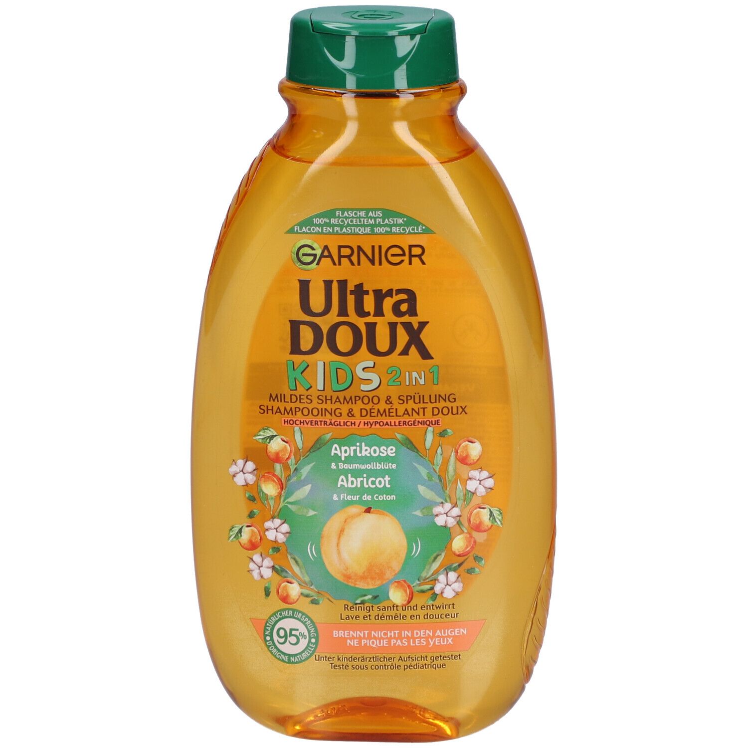 Garnier Ultra Doux Kids 2 en 1, abricot et fleur de coton. Bouteille orange avec bouchon vert. Étiquette produit.
