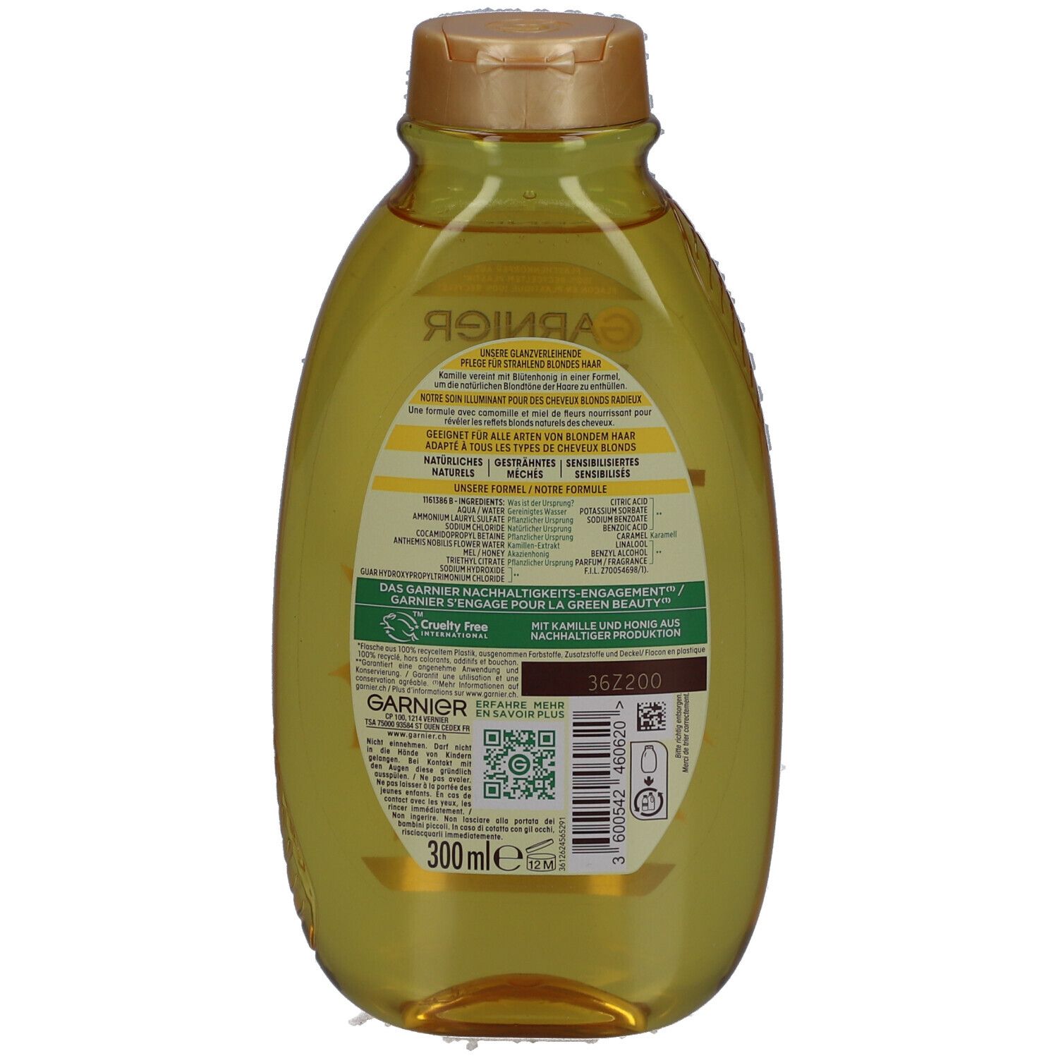 Achterkant van de Garnier Ultra Doux shampoo fles. Tekst en QR-code. Bruine productinformatie. 300 ml.